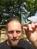 Dan with a geocache.