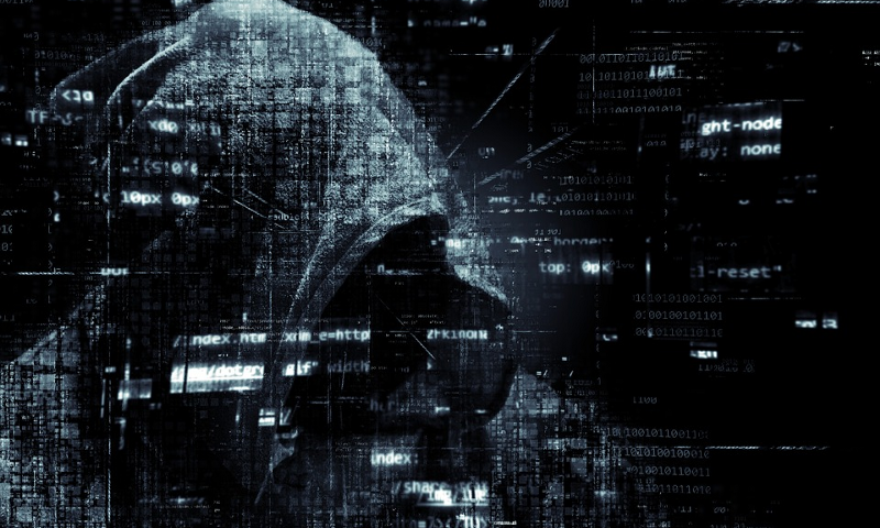 Hacker figure among code