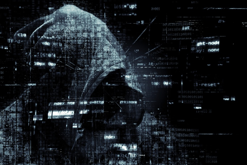 Hacker figure among code