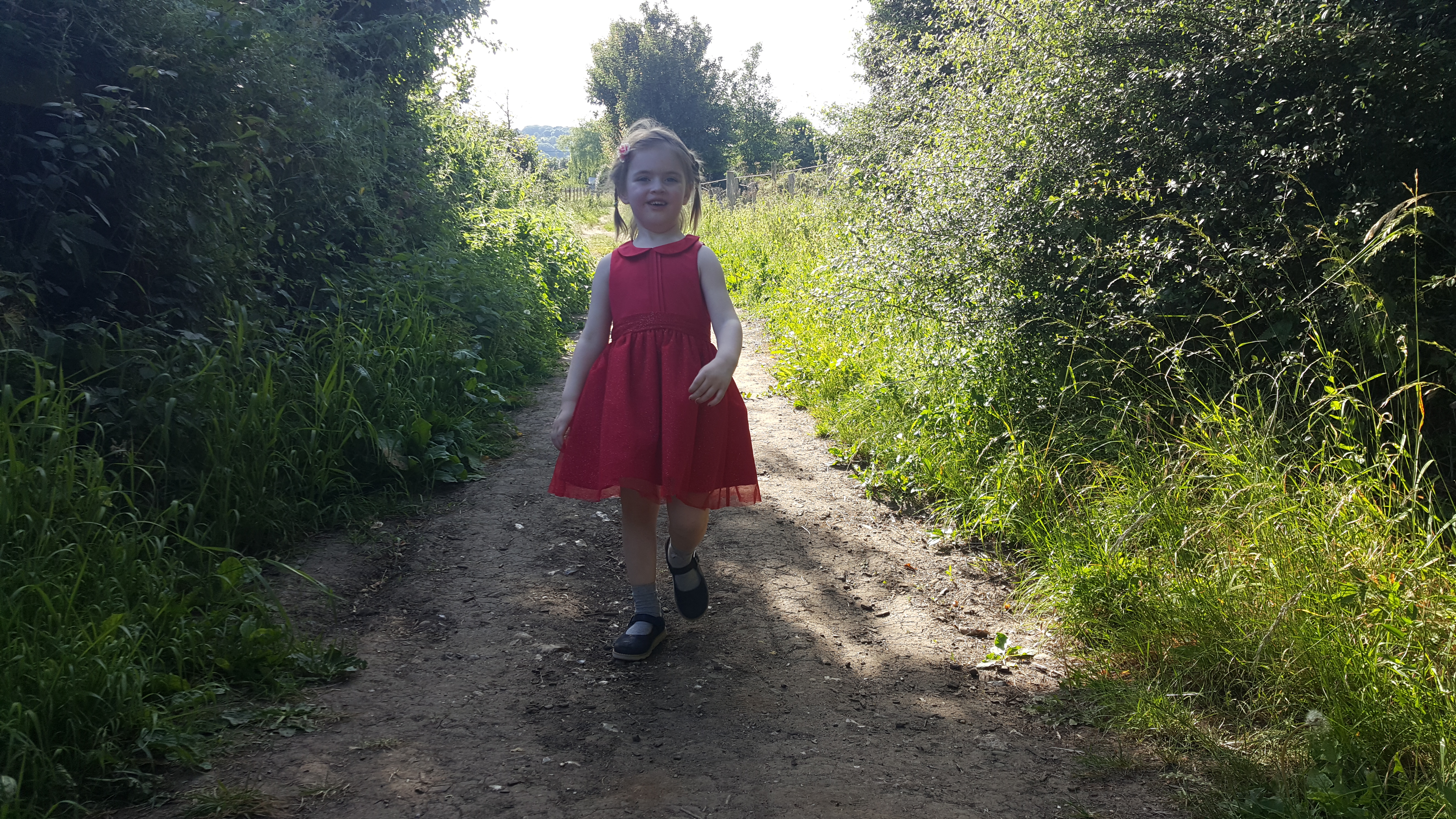 Full image of Annabel walking to the cache.