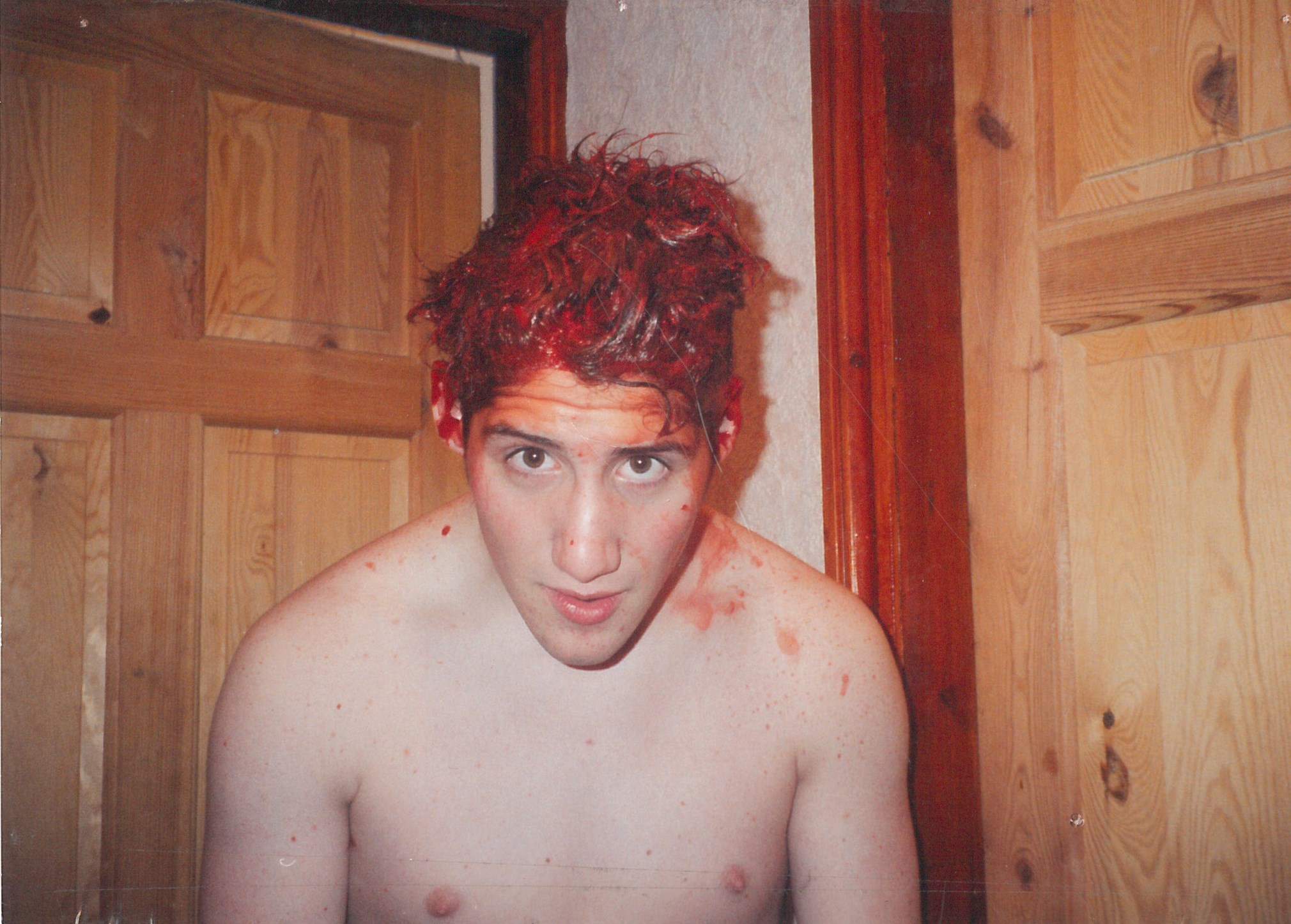 Full image of Gary covered with red hair dye