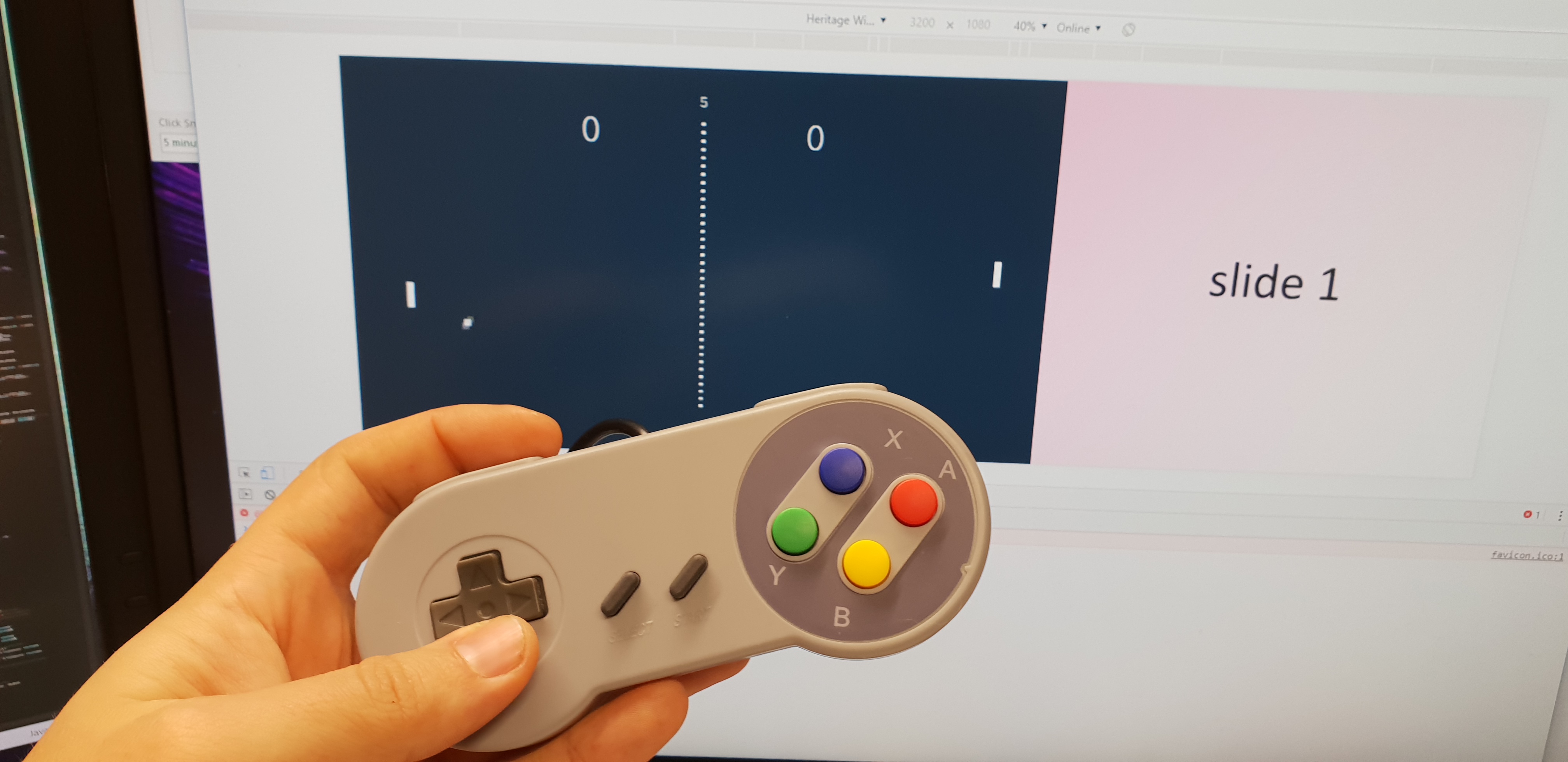 Full image of Pong prototype with a SNES controller on my work PC