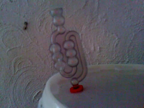 Image representing post: An airlock bubbles as beer brews