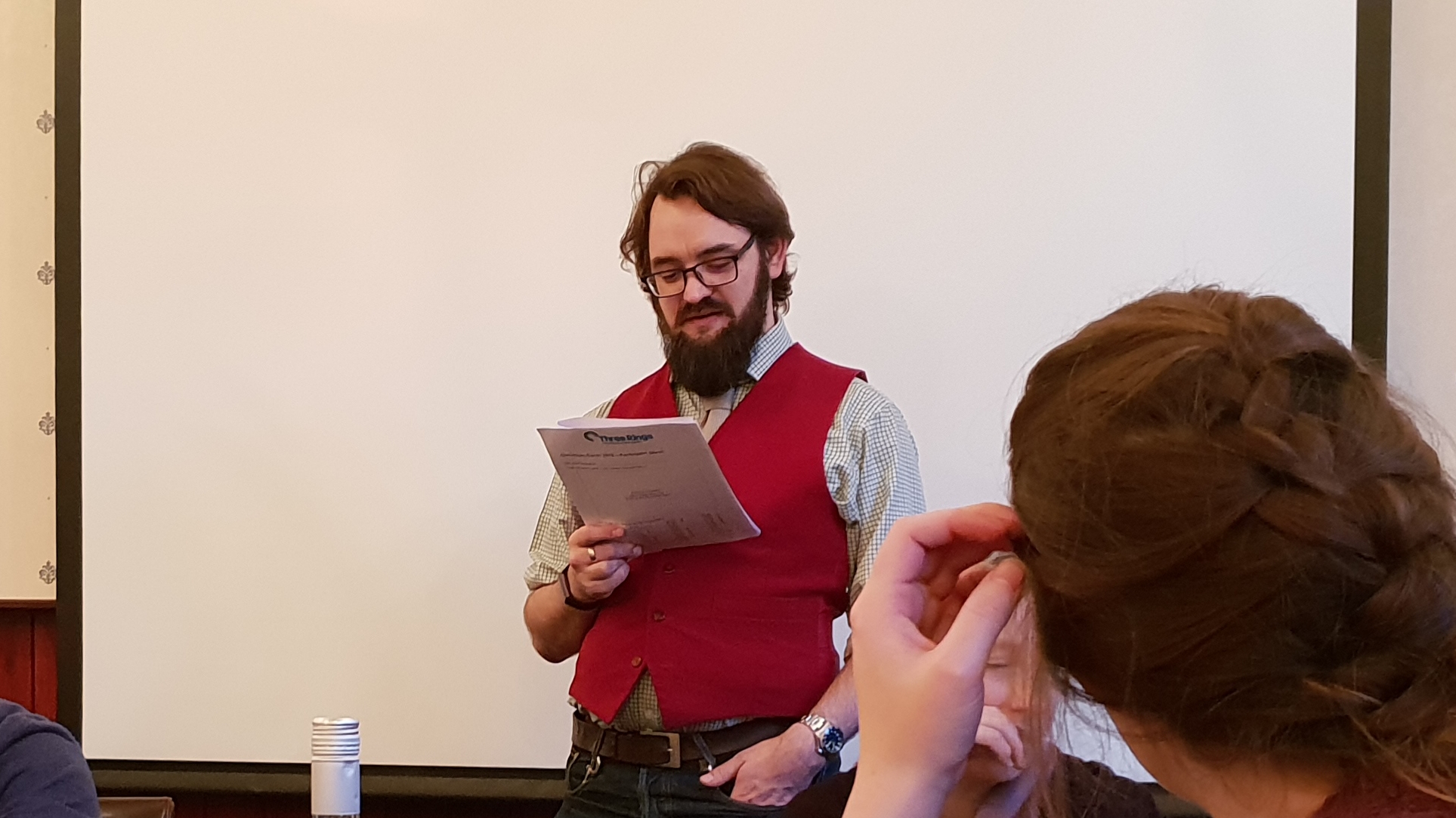 Full image of JTA delivering the 2018 Three Rings Christmas Quiz.