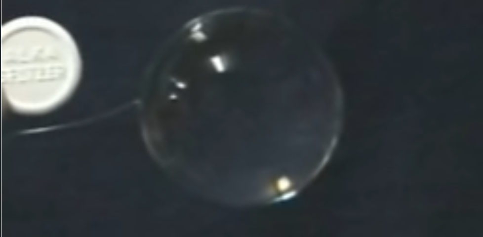 Image representing post: Alka-Seltzer added to spherical water drop in microgravity