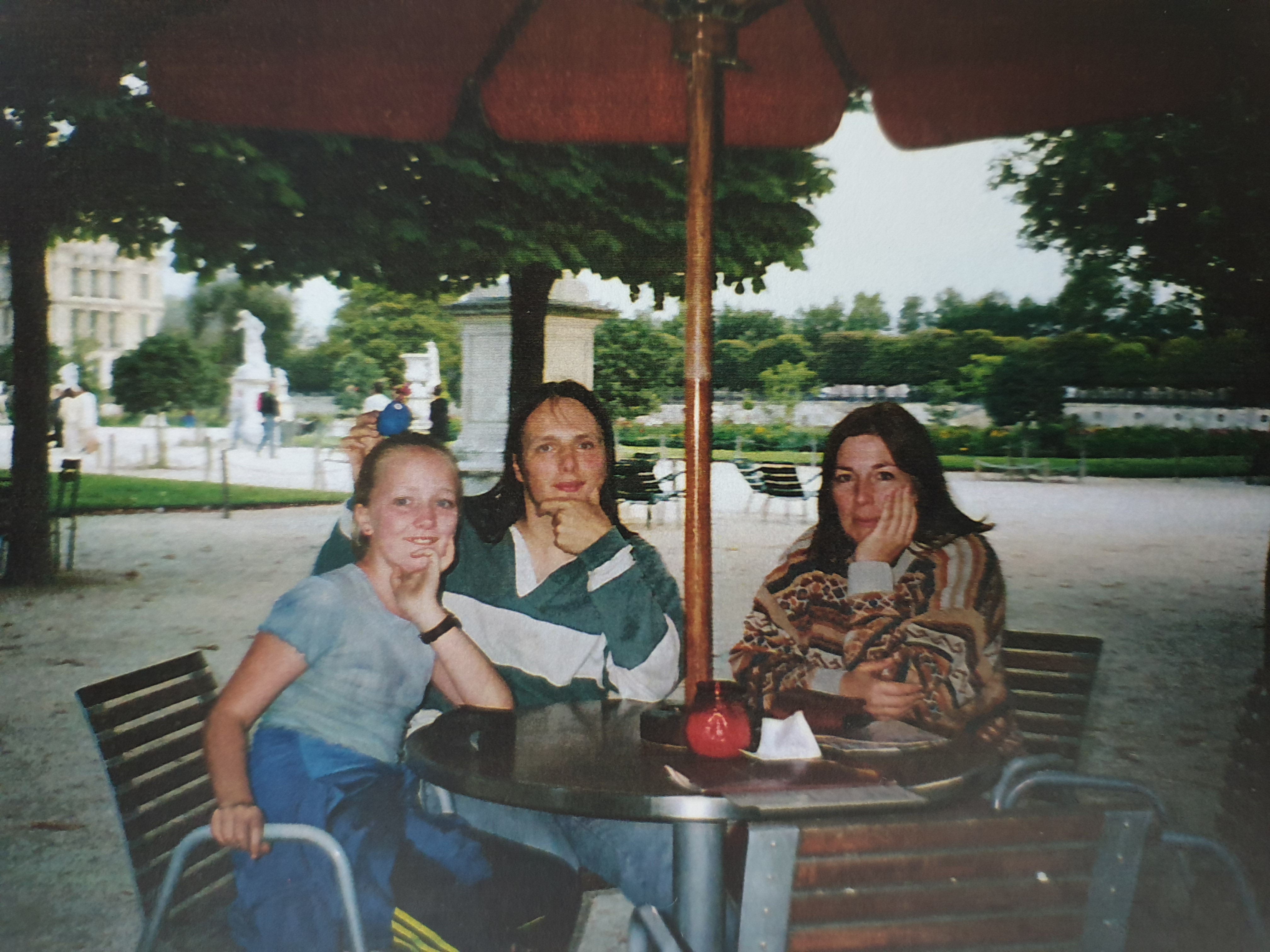 Full image of Dan with his sister and his mother in a Paris cafe, in advance of the August 1999 solar eclipse.