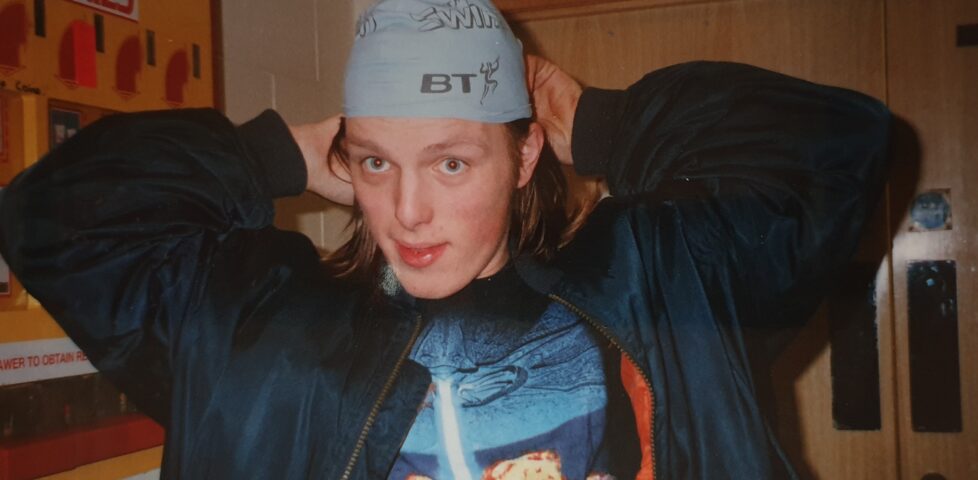 Dan tries on his swim cap in advance of the BT Swimathon 1999.