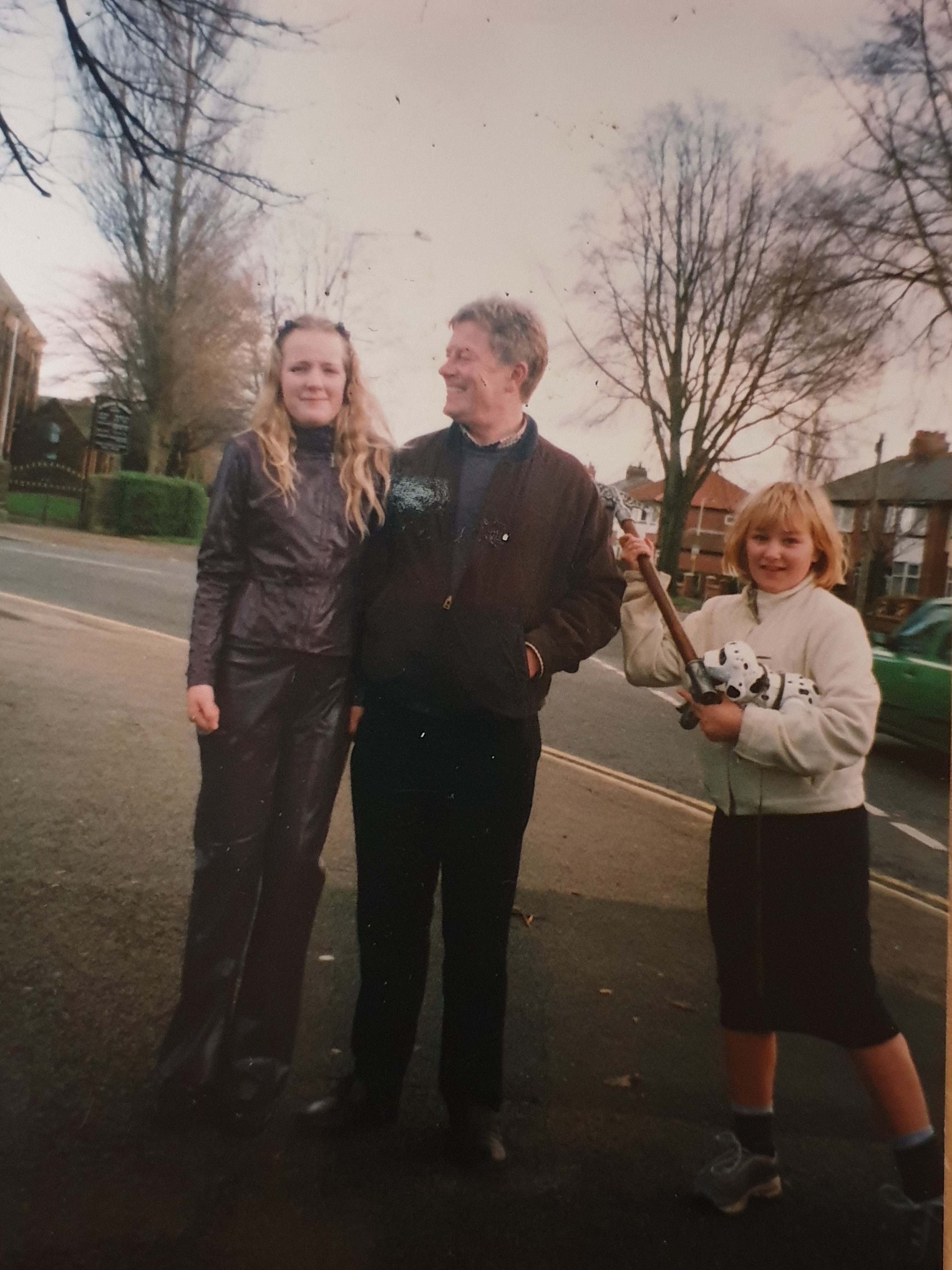 Full image of Dan's sisters with their Uncle David; Becky has Dan's new battle-axe