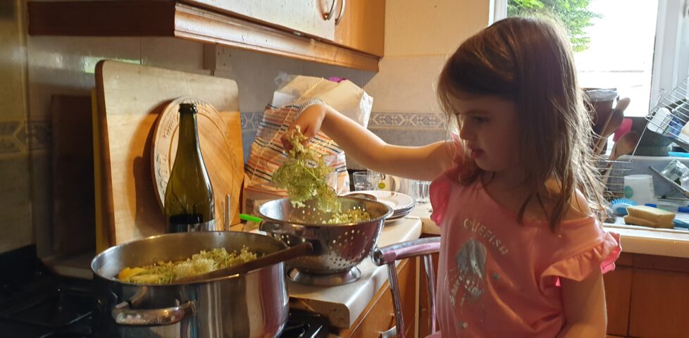 Annabel making elderflower cordial