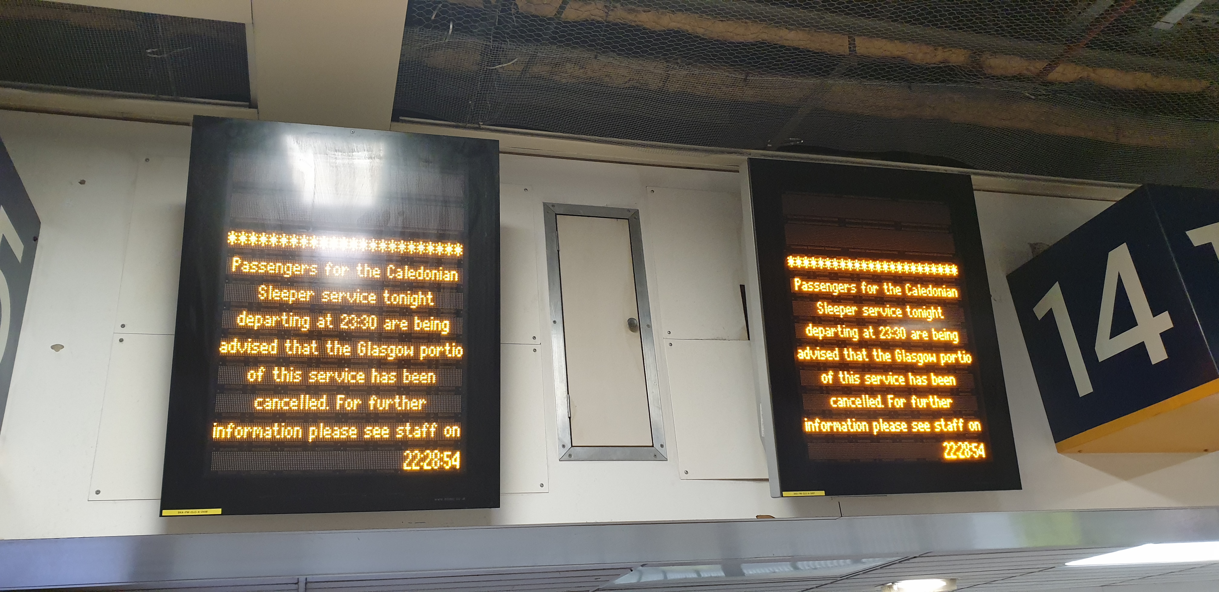 Full image of Digital display board: "Passengers for the Caledonian Sleeper service tonight departing at 23:30 are being advised that the Glasgow portio [sic] of this service has been cancelled. For further information please see staff on"
