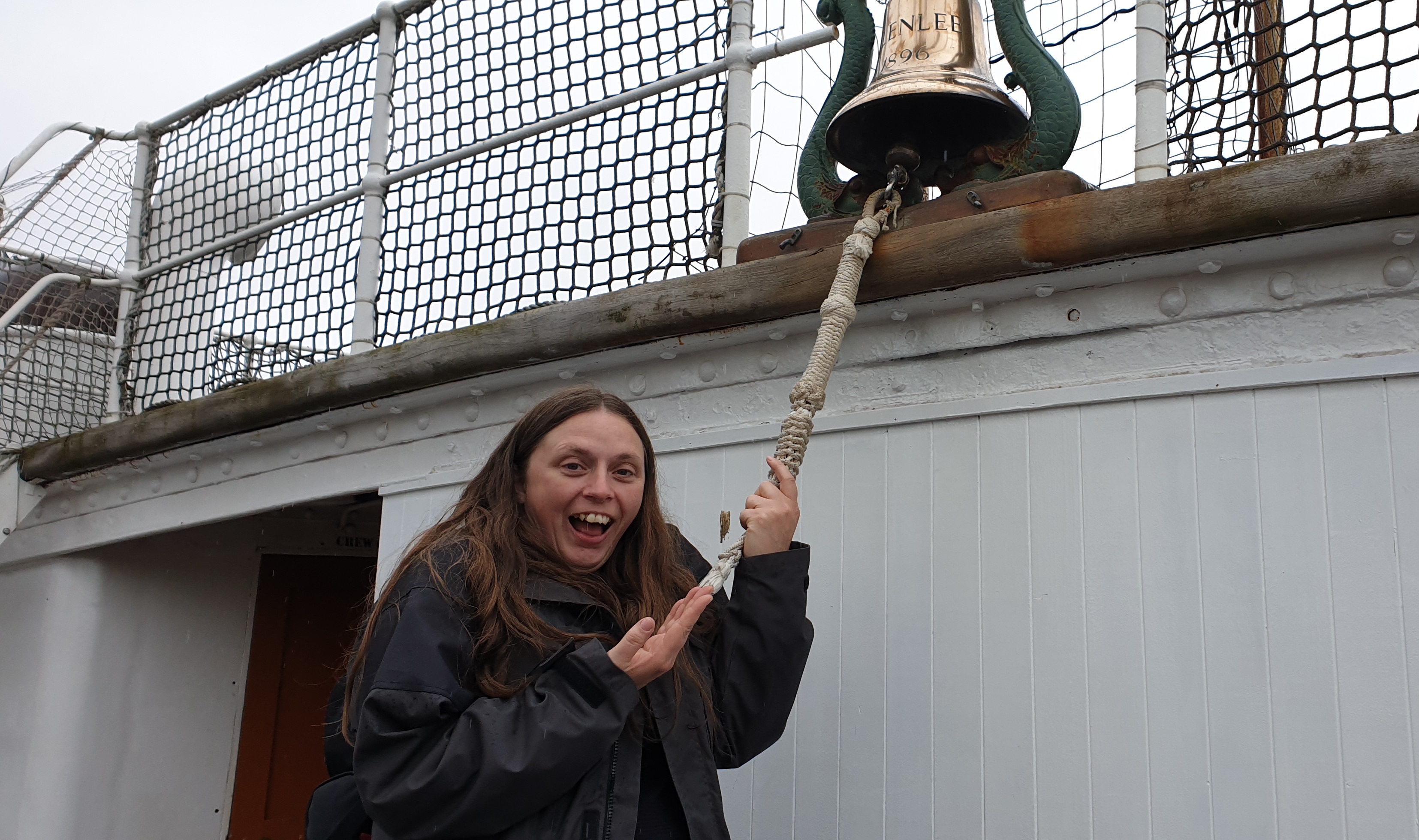 Full image of Ruth rings the bell on the Glenlee