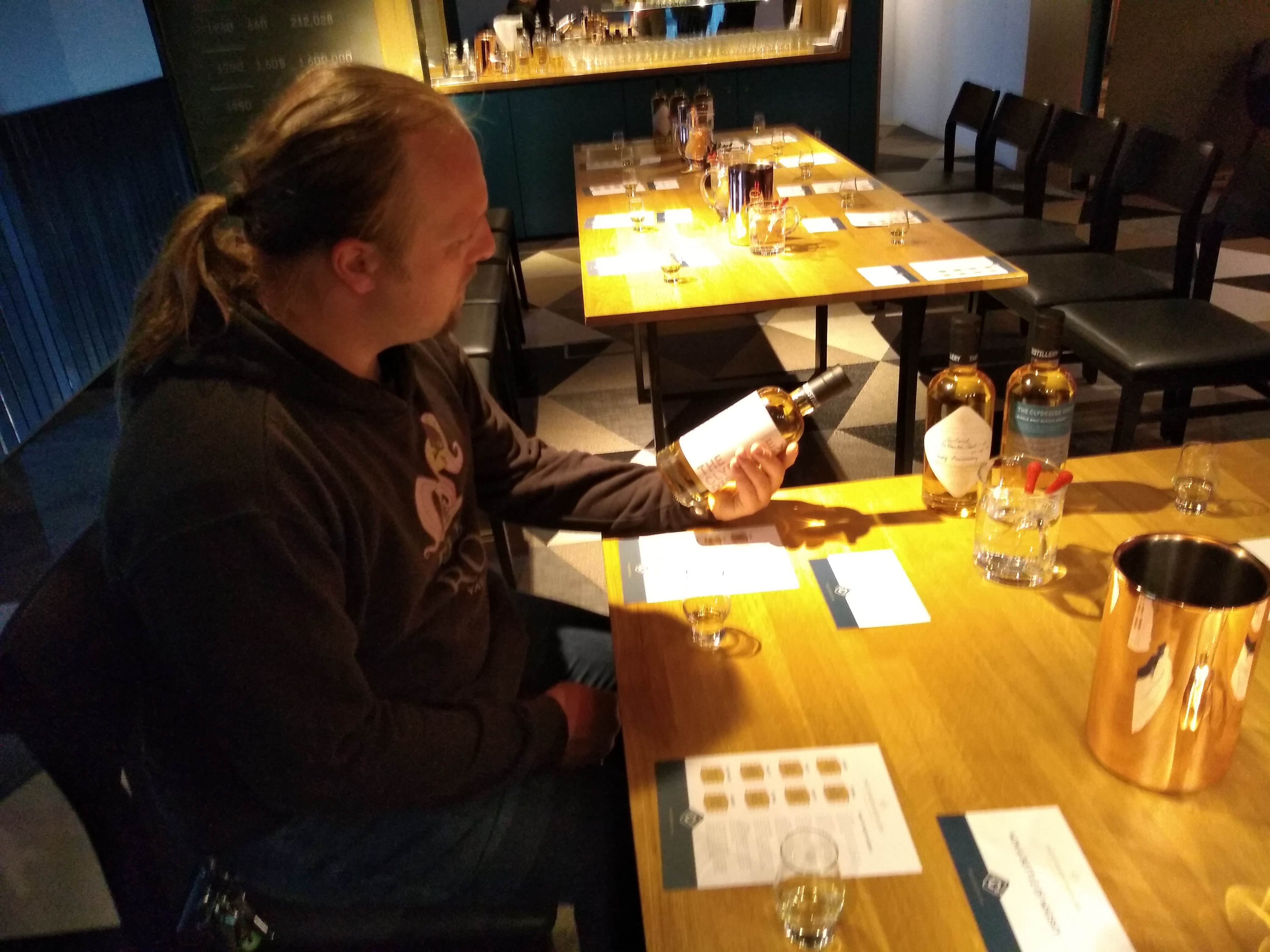 Full image of Dan at the whisky tasting.