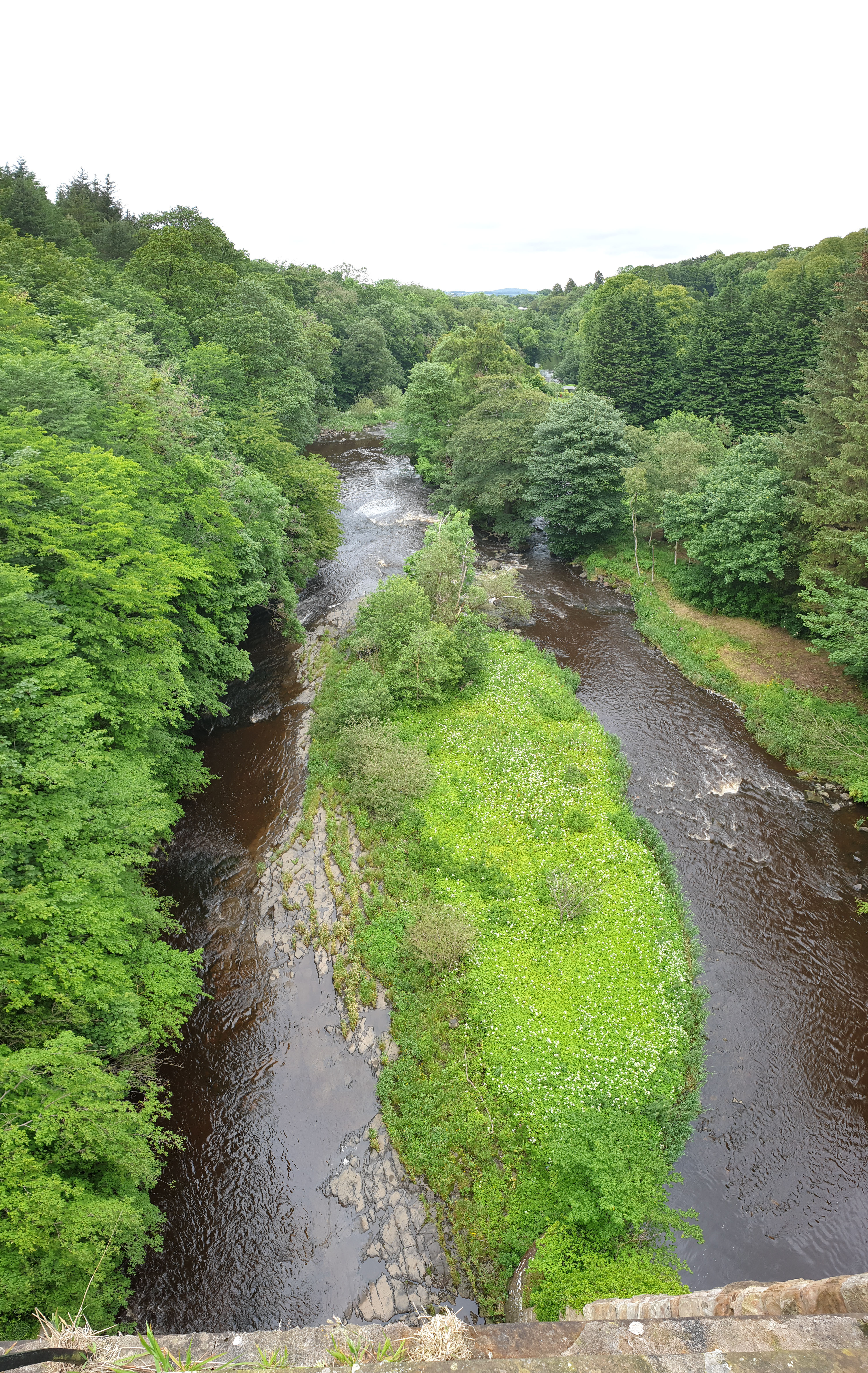 Full image of River Almond viewed from the Union Canal aqueduct that spans it (edited: removed aeroplane)