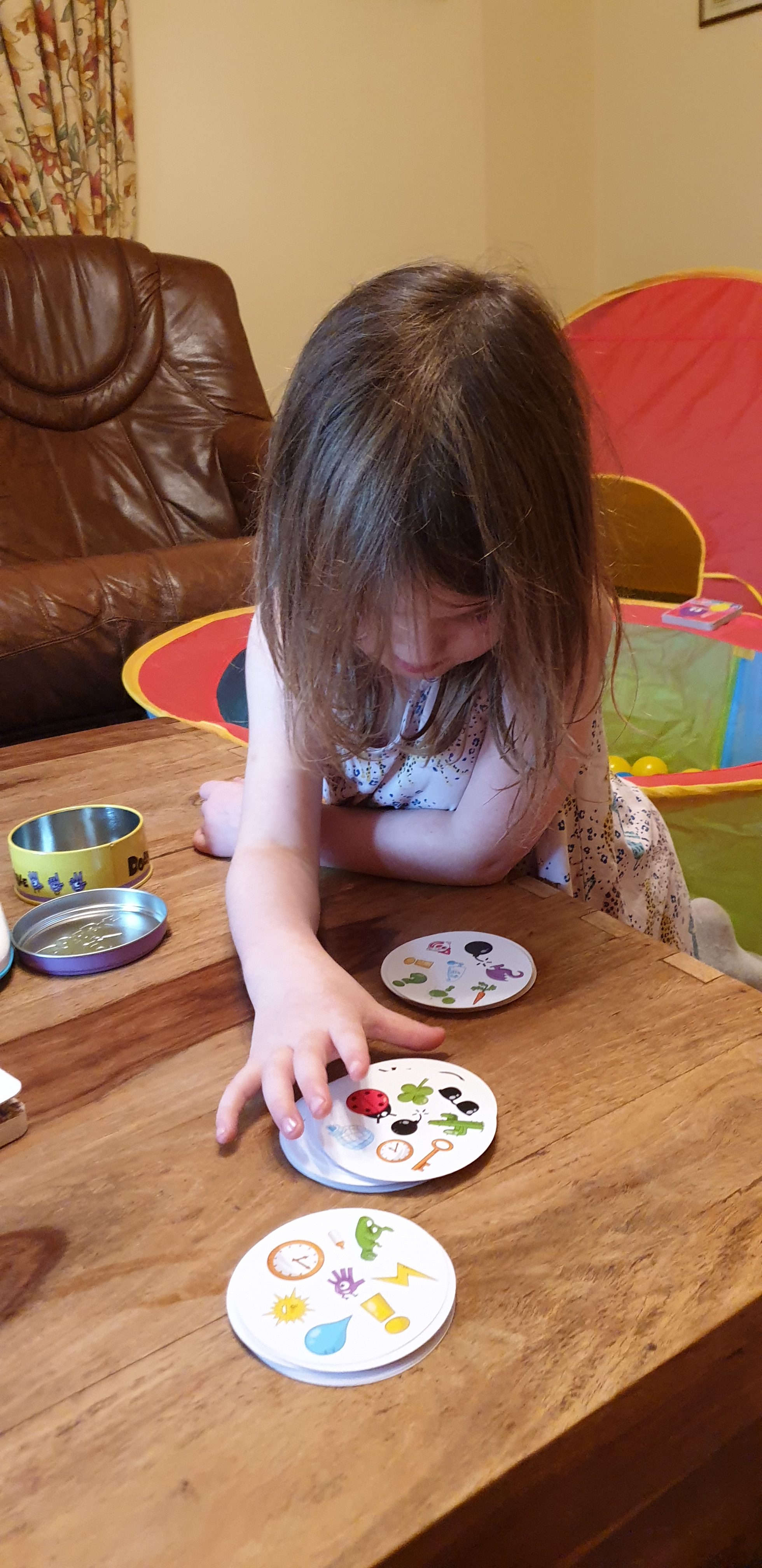 Full image of Annabel plays Dobble.