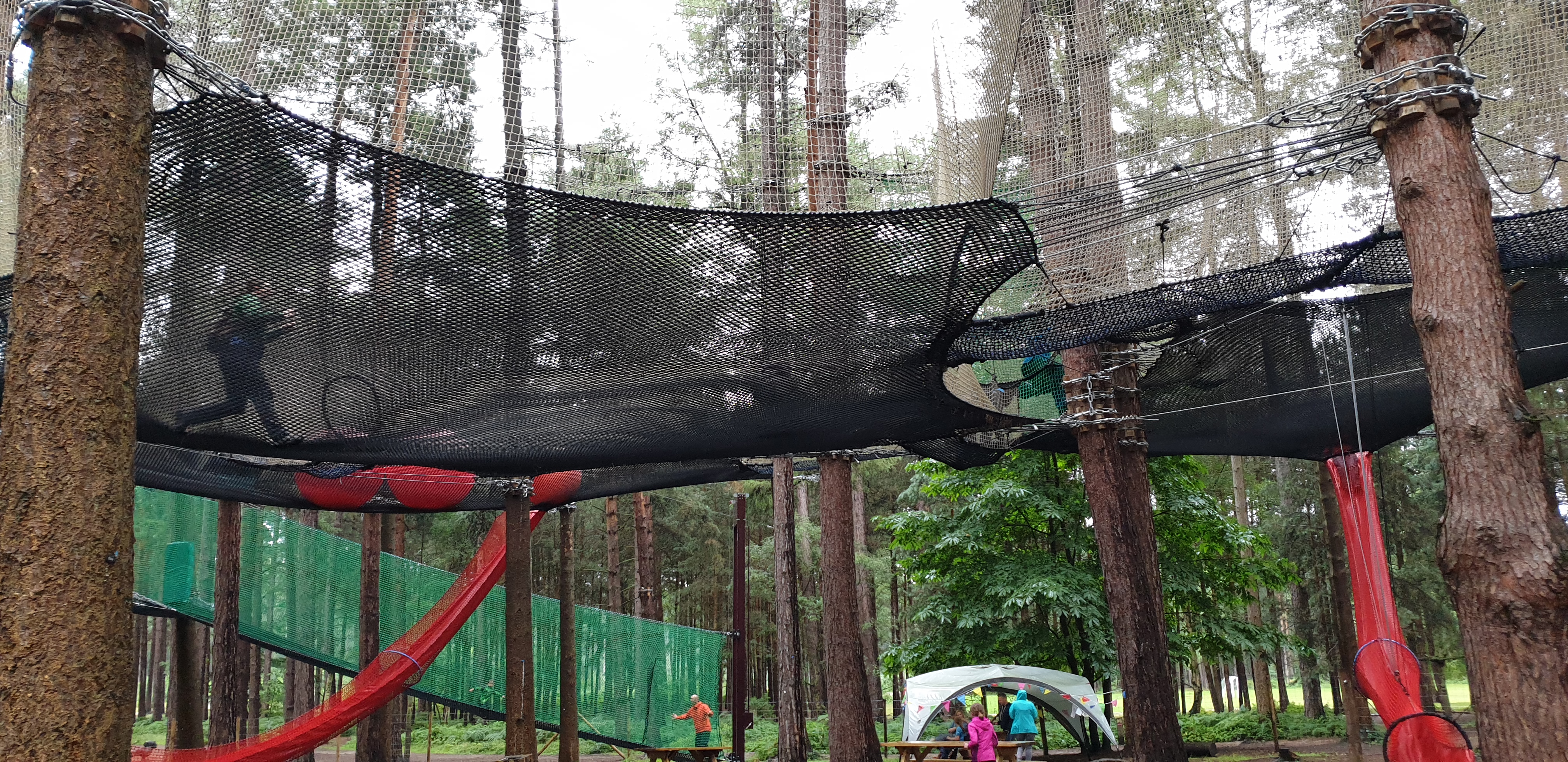 Full image of Ruth chases Annabel across the top nets.