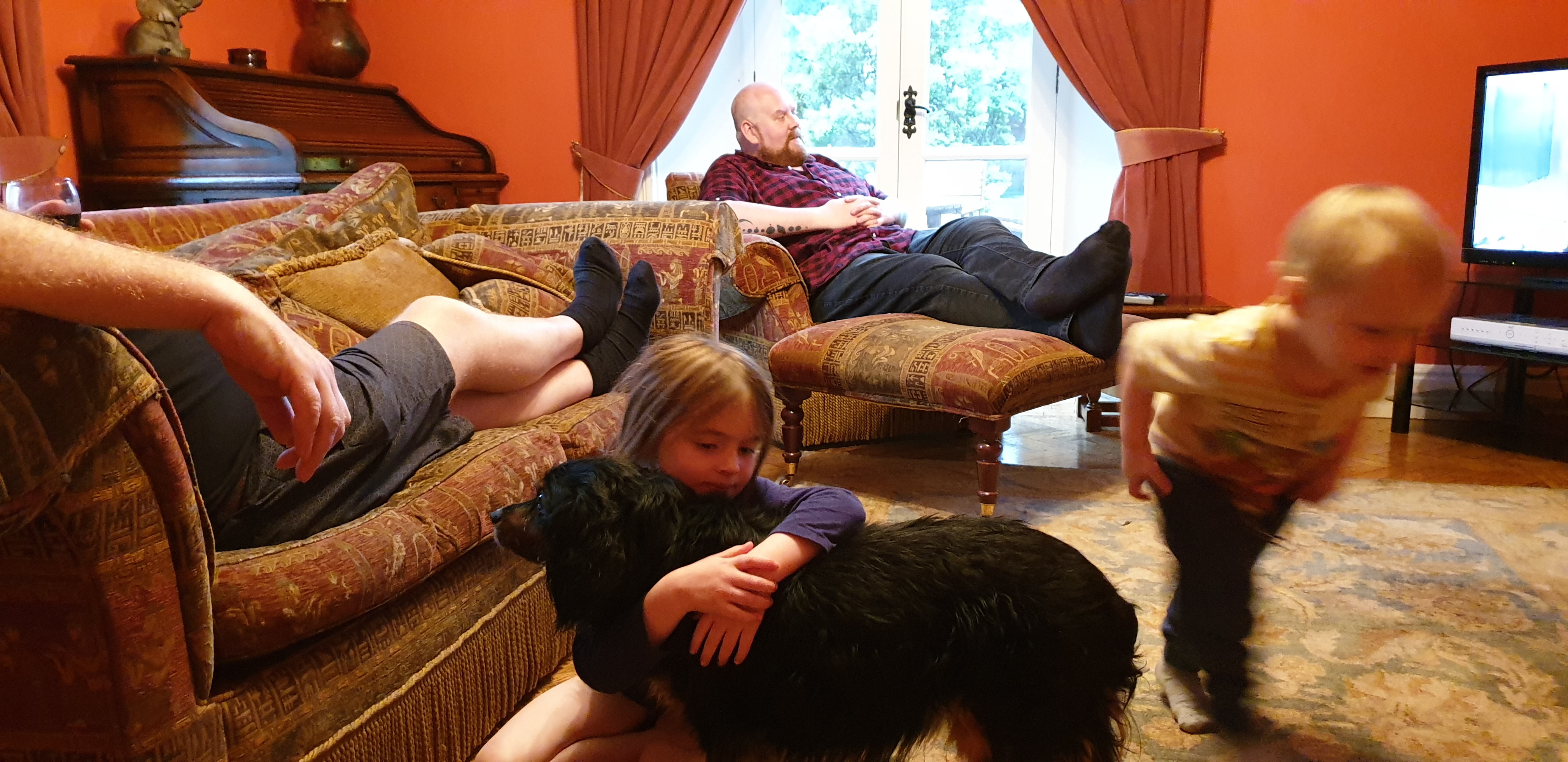 Full image of Annabel hugs Rufus the dog #2.