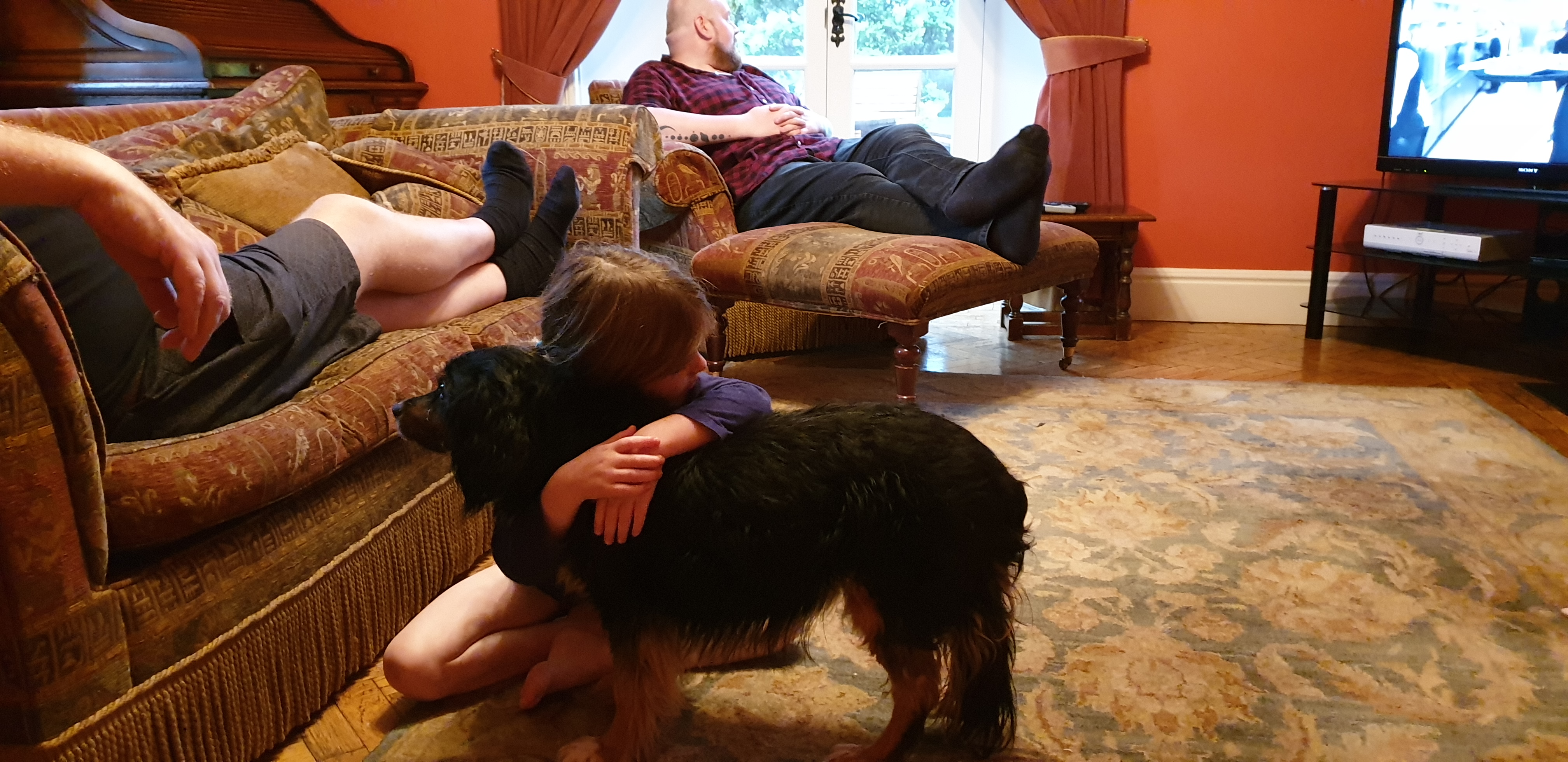 Full image of Annabel hugs Rufus the dog #1.