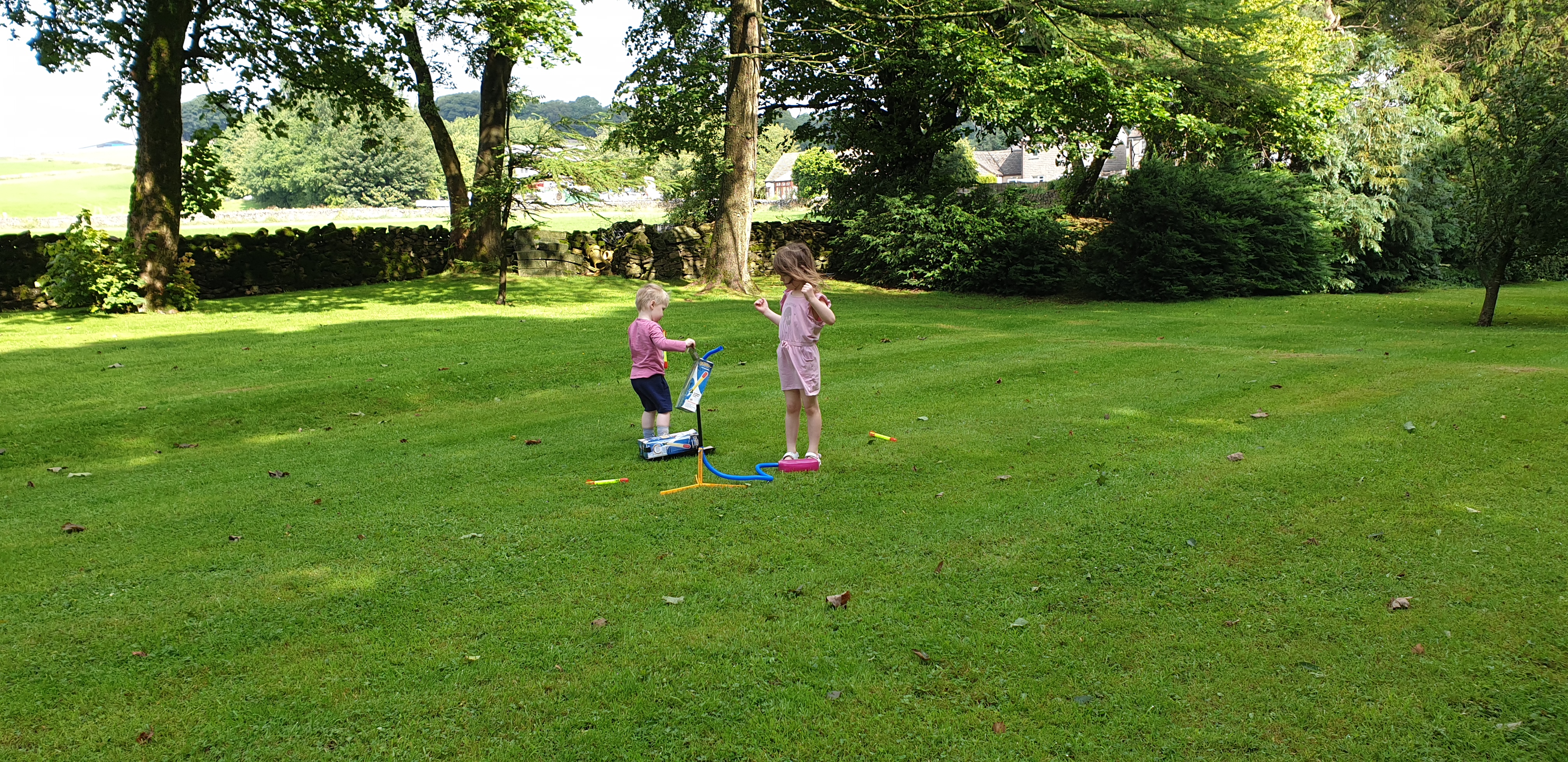 Full image of John and Annabel launch stomp rockets.