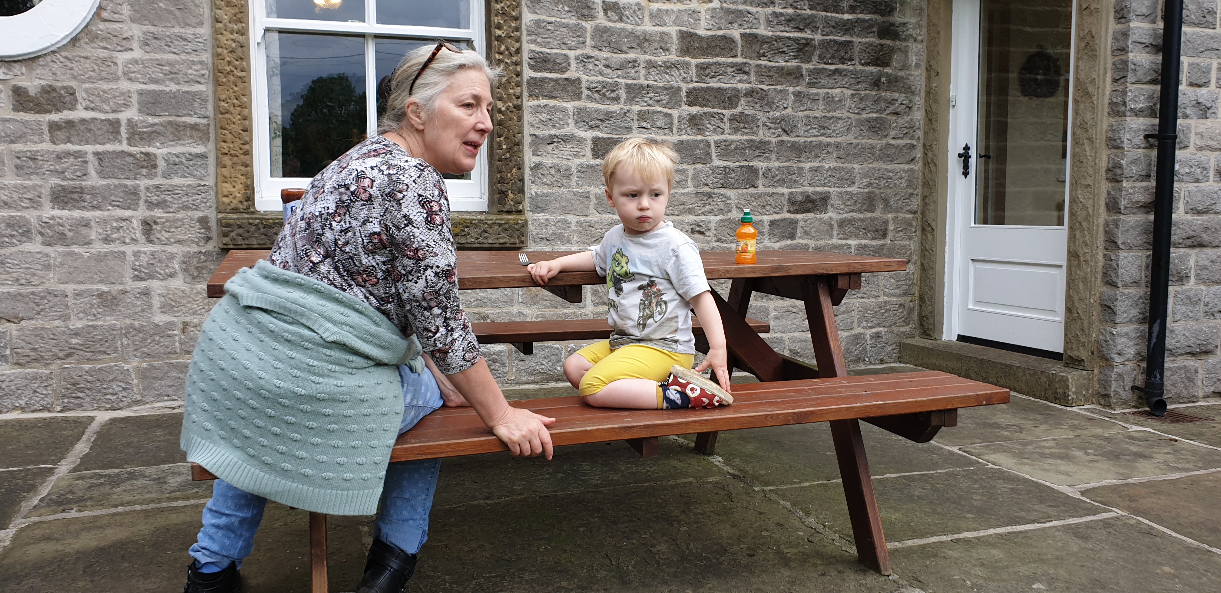 Full image of Nanna Doreen talks to John on the benches #2.