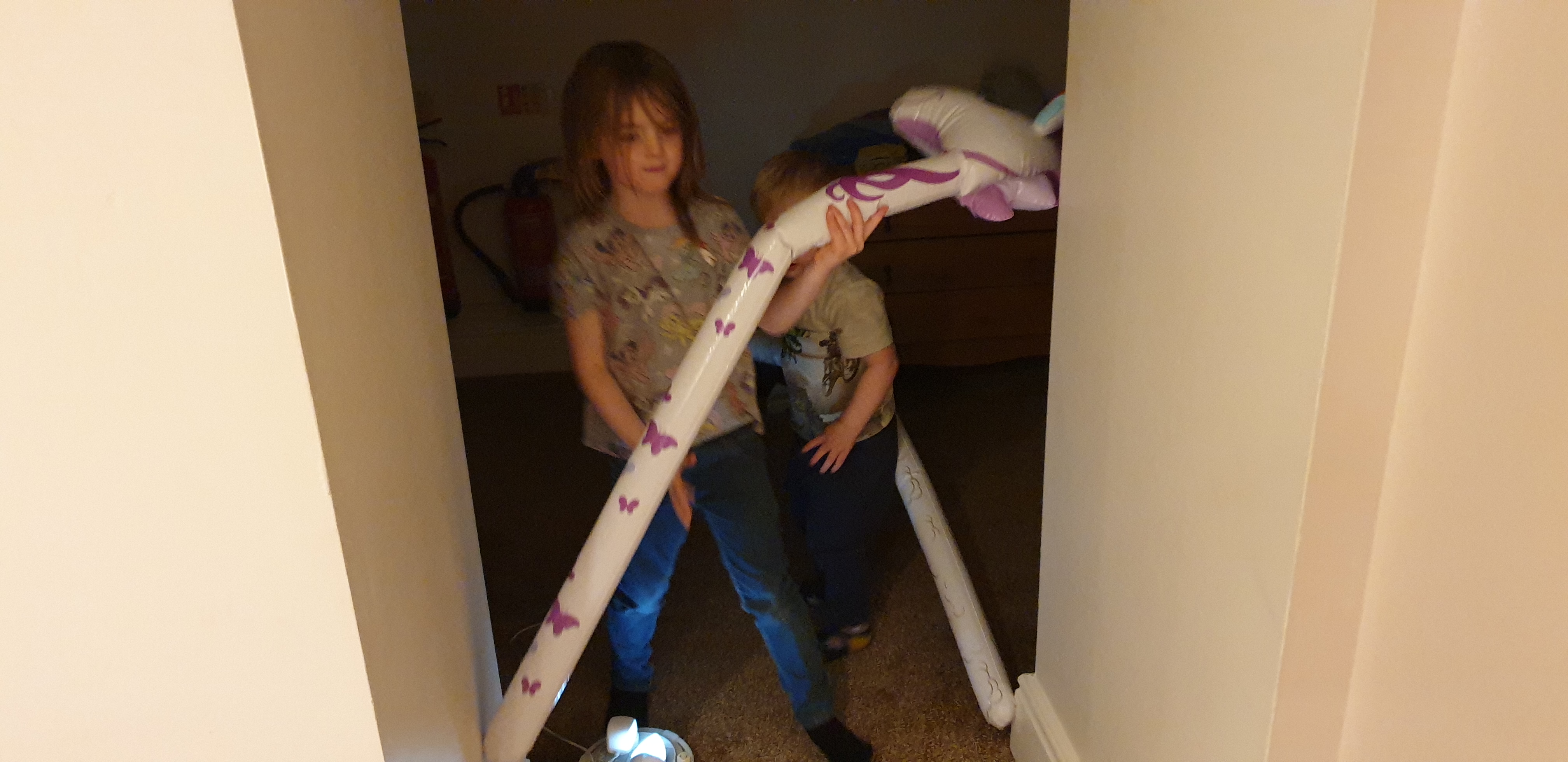 Full image of Annabel and John with inflatable animals #1.