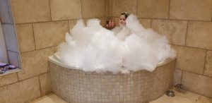 Annabel in an extremely bubbly bath.