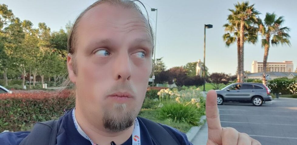 Dan with a 30-foot statue of the Virgin Mary in the background.