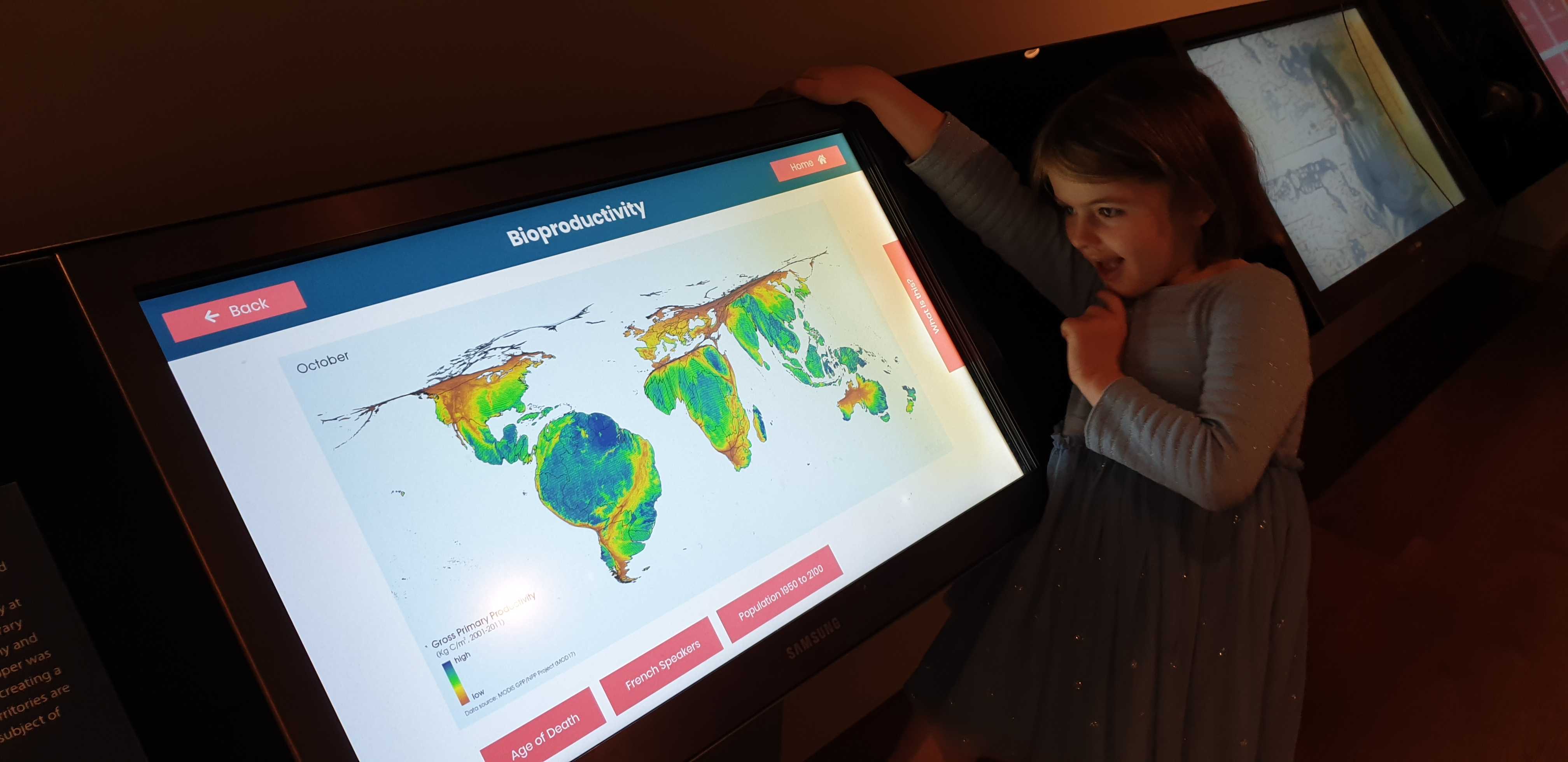 Full image of Annabel explores the Talking Maps digital interactives.