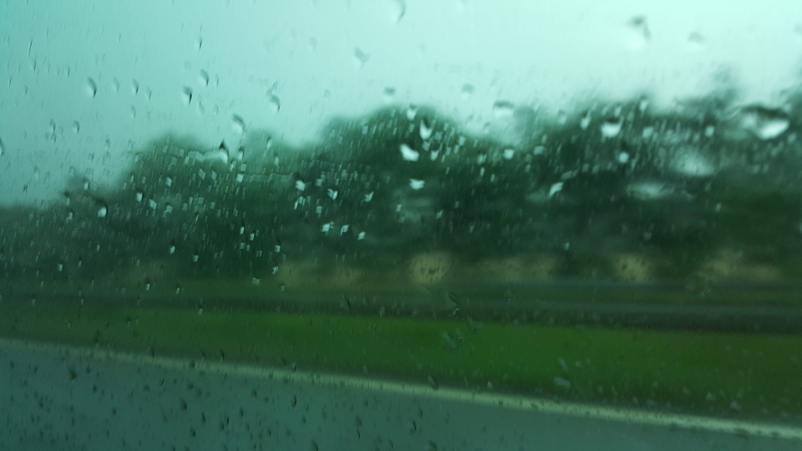 Full image of Rain in Lanark, seen through a car window