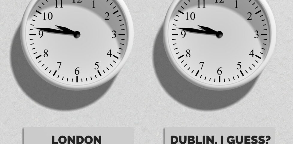 Two clocks, both showing the same time. One has a sign reading "LONDON", the other "DUBLIN, I GUESS?"