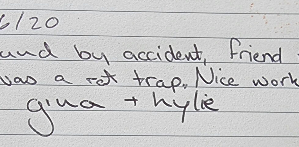 Handwritten note from the geocache log: "8/6/20 found by accident, friend thought it was a rat trap. Nice work. gina + kylie"