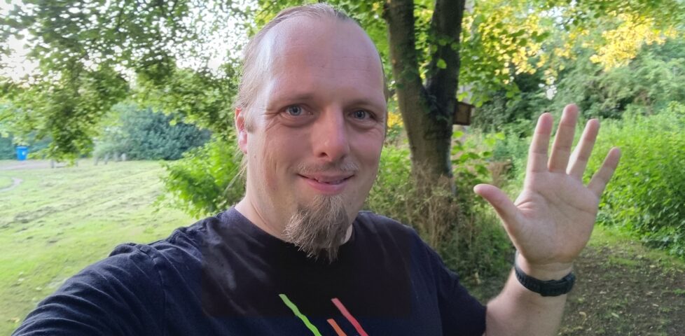 Dan hunting for a geocache in Lichfield.