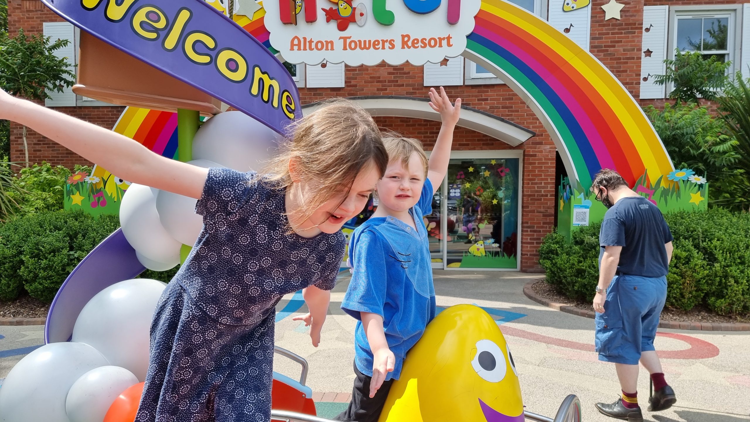 Full image of Children playing outside the CBeebies Land Hotel