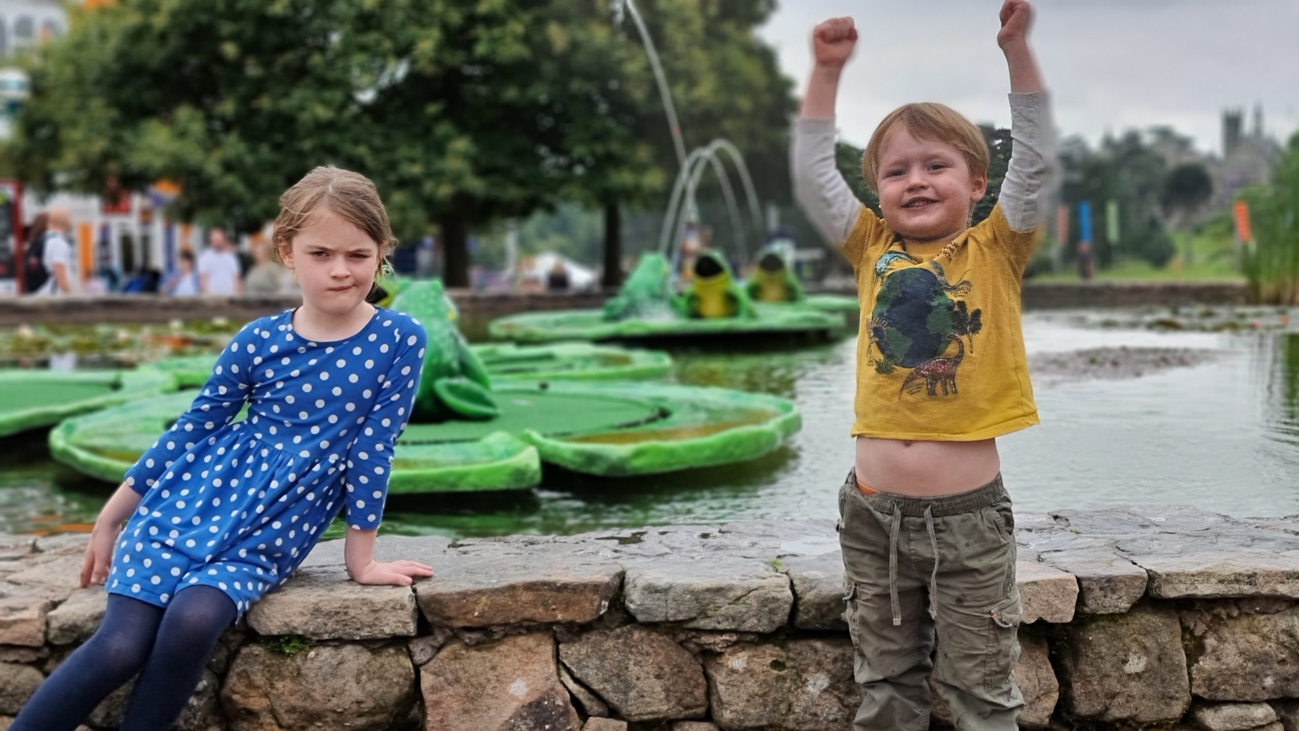 Full image of Kids at the "frog" fountains near the entrance to Alton Towers' theme park.