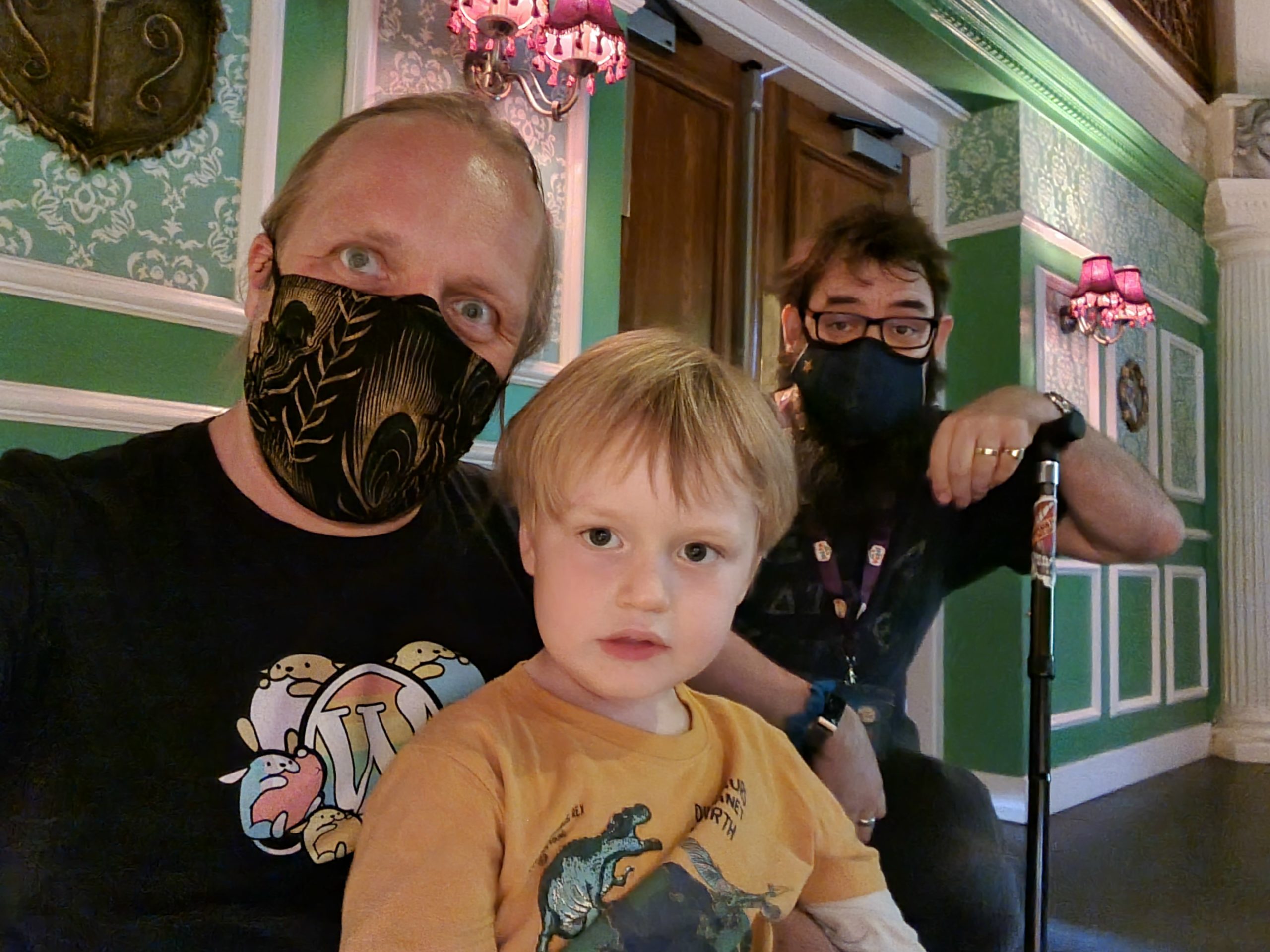 Full image of Dan and JTA wear masks indoors.