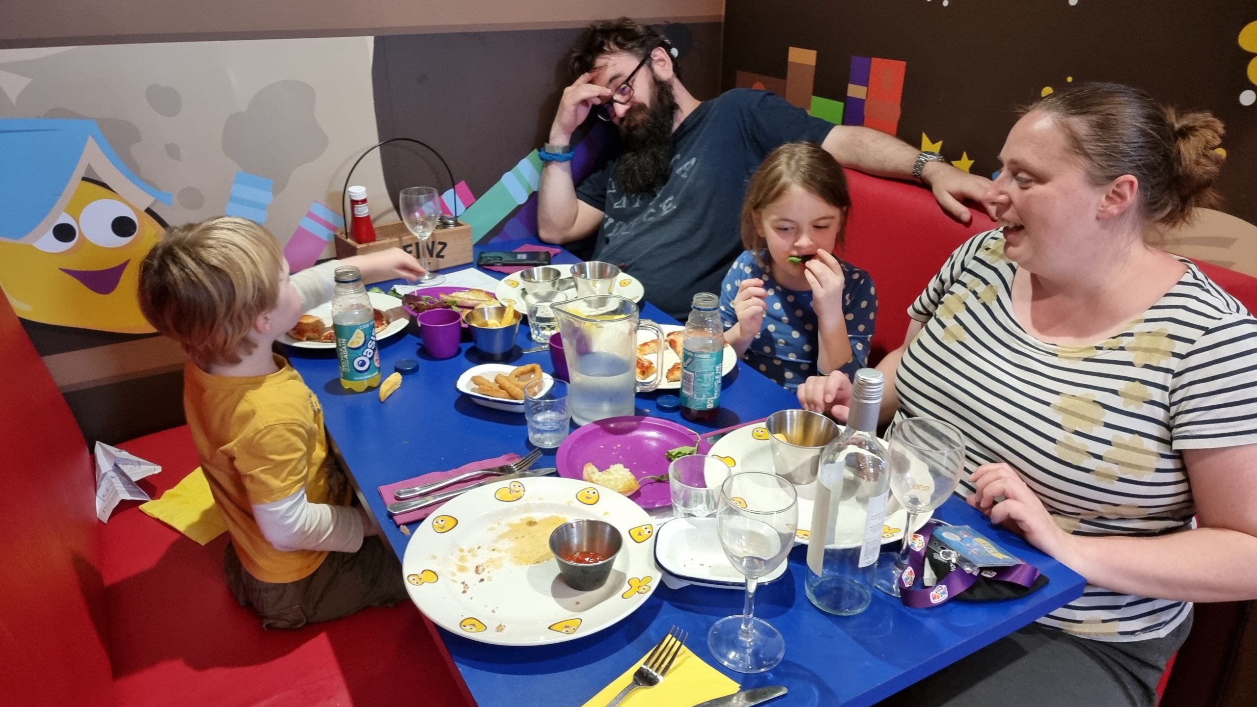 Full image of Ruth, JTA and the kids eat dinner.