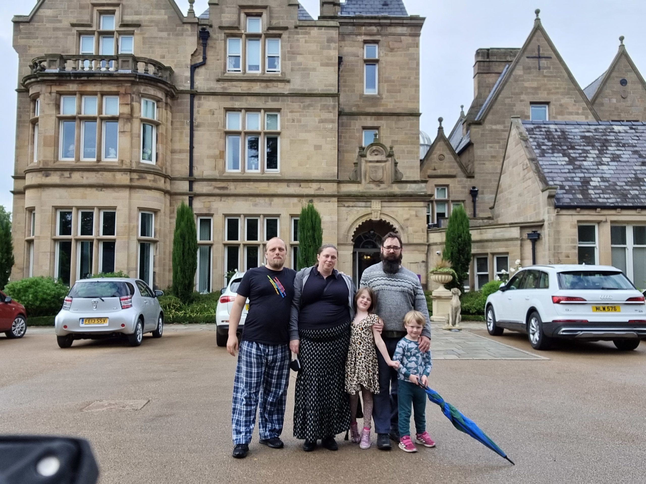 Full image of Dan, Ruth, JTA and the kids outside St. Elphin's Park Retirement Village.