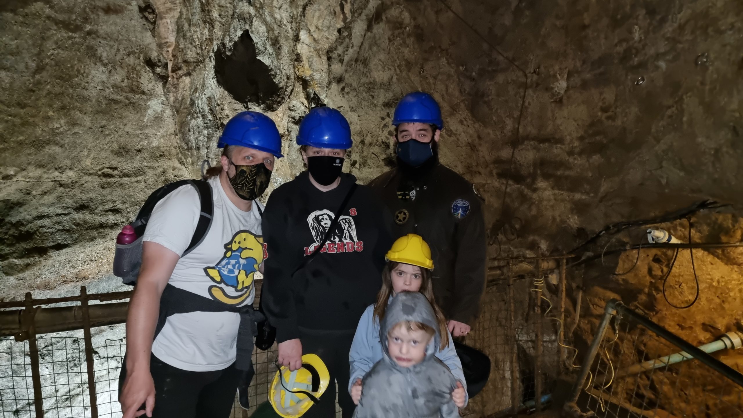 Full image of Dan, Ruth, JTA and the kids above the "bottomless pit" in Speedwell Cavern.