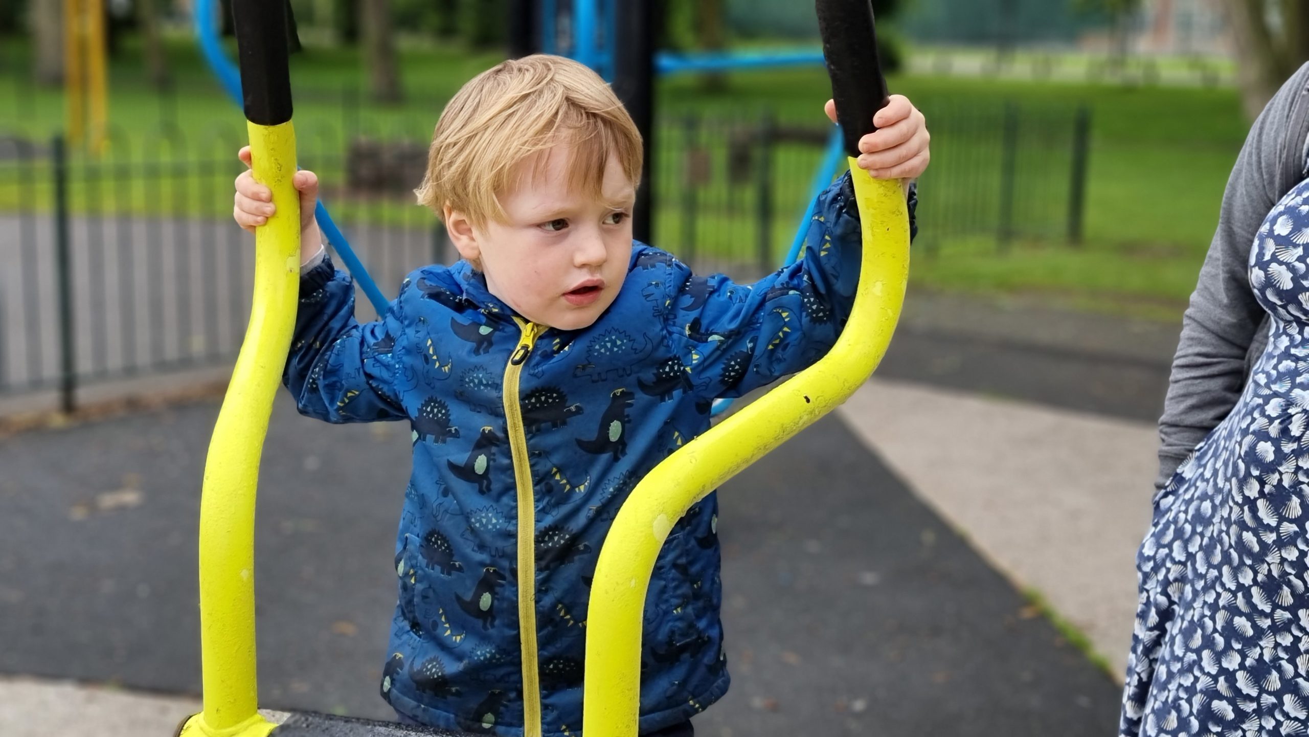 Full image of A boy on a cross-trainer.