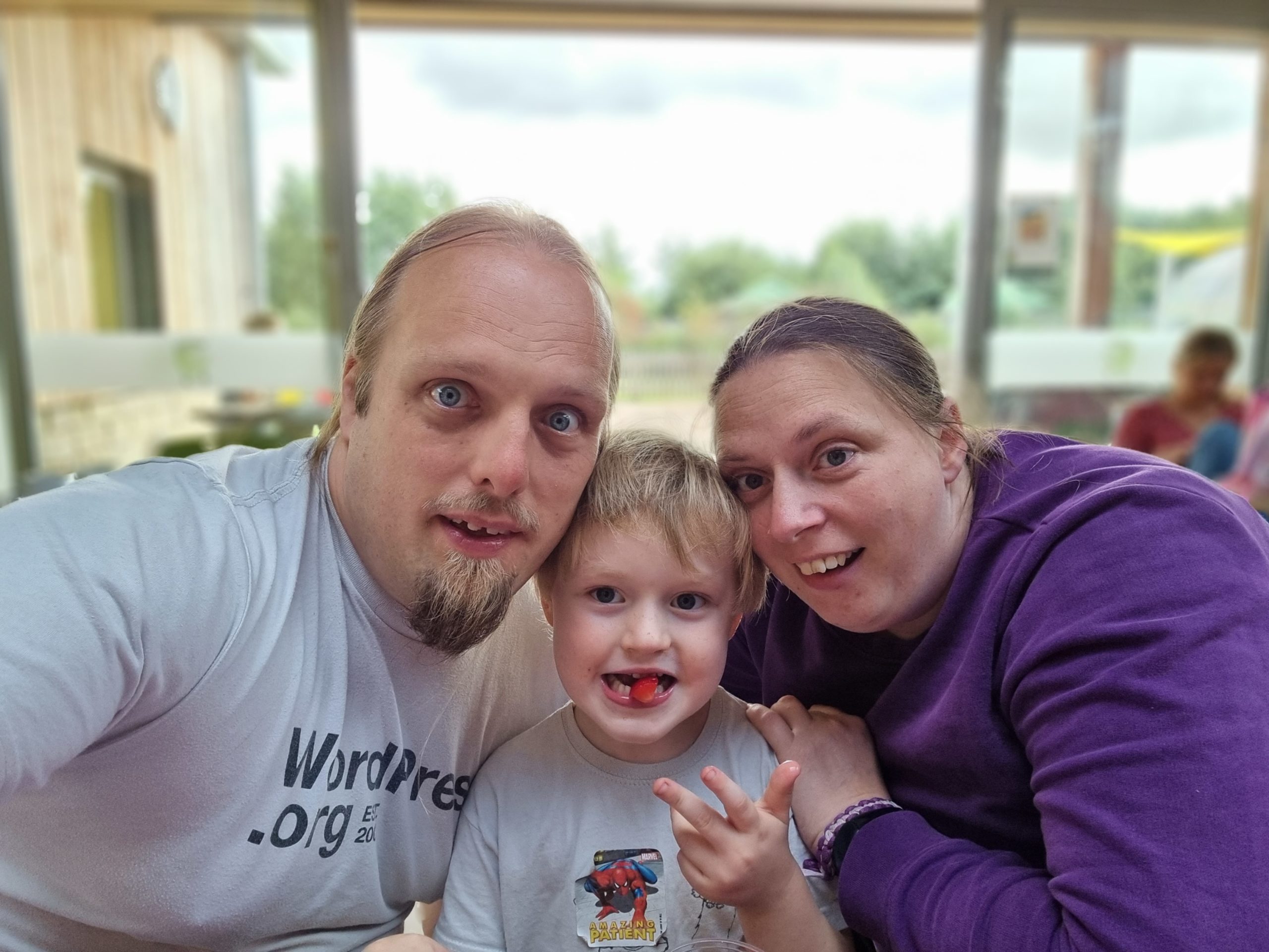 Full image of Dan and Ruth with their 4-year-old.
