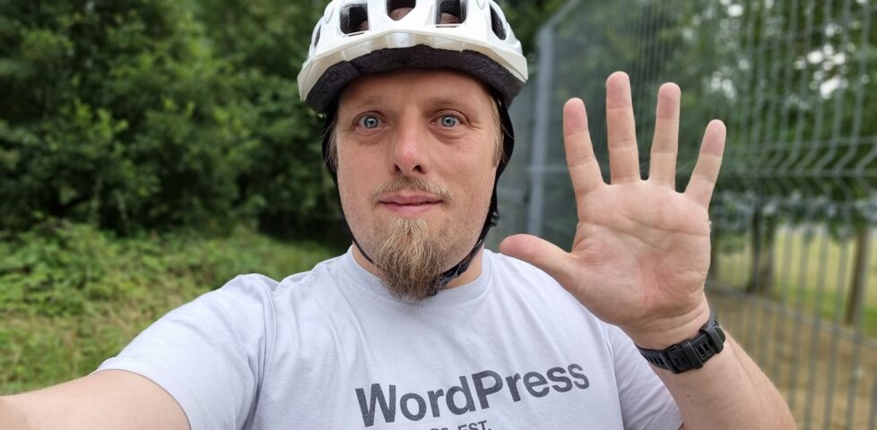 Dan, on his bike, waves.