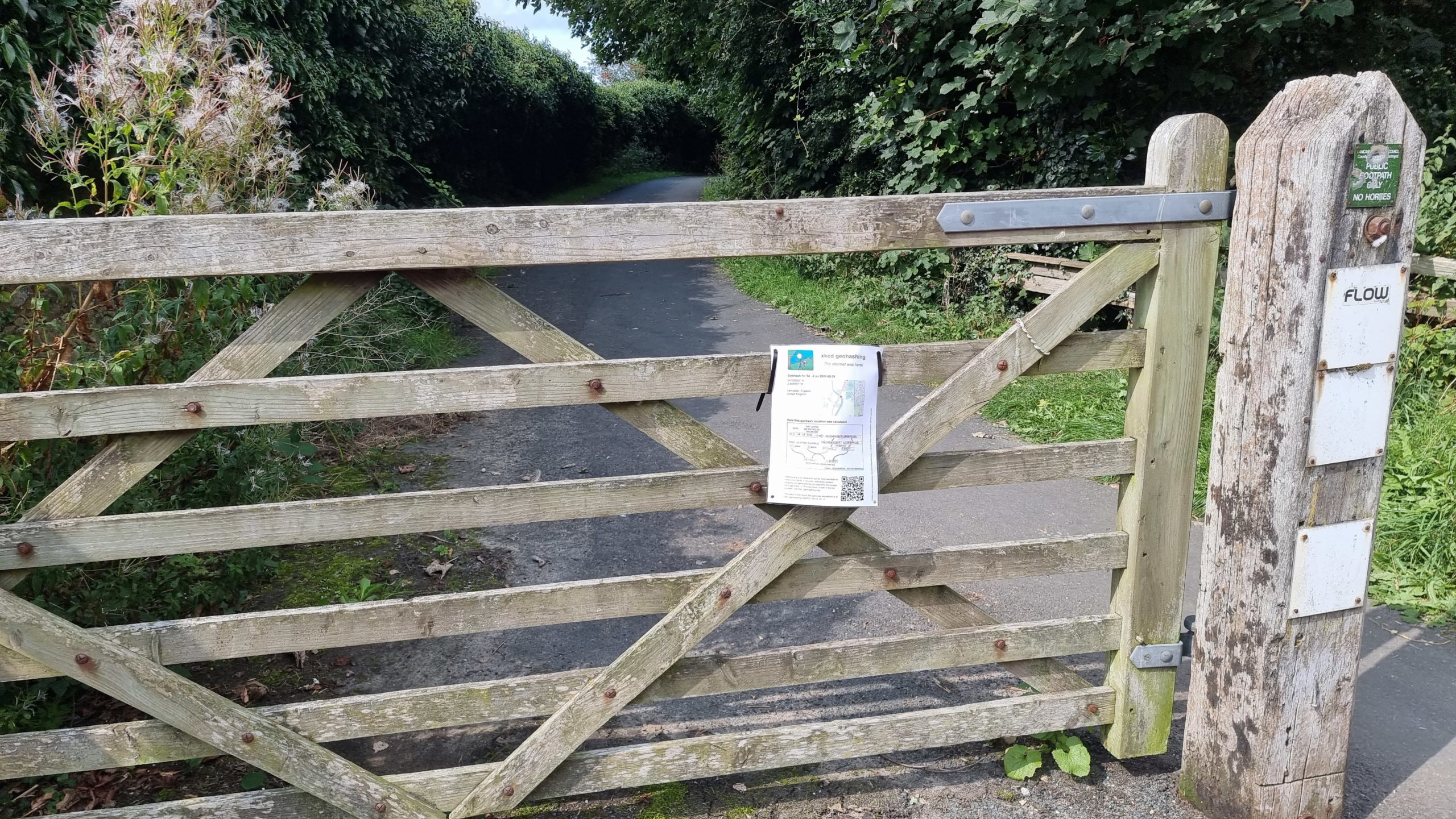 Full image of Gate with sign