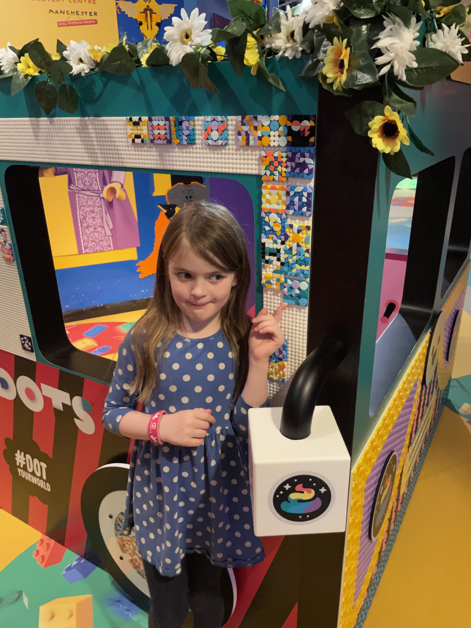Full image of Child with a contributory LEGO mosaic.