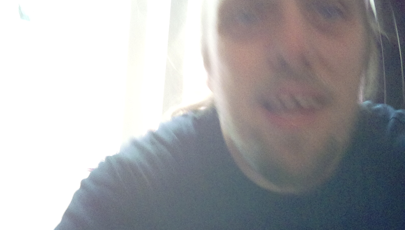 Full image of Extremely blurred close-up photo of Dan's face.