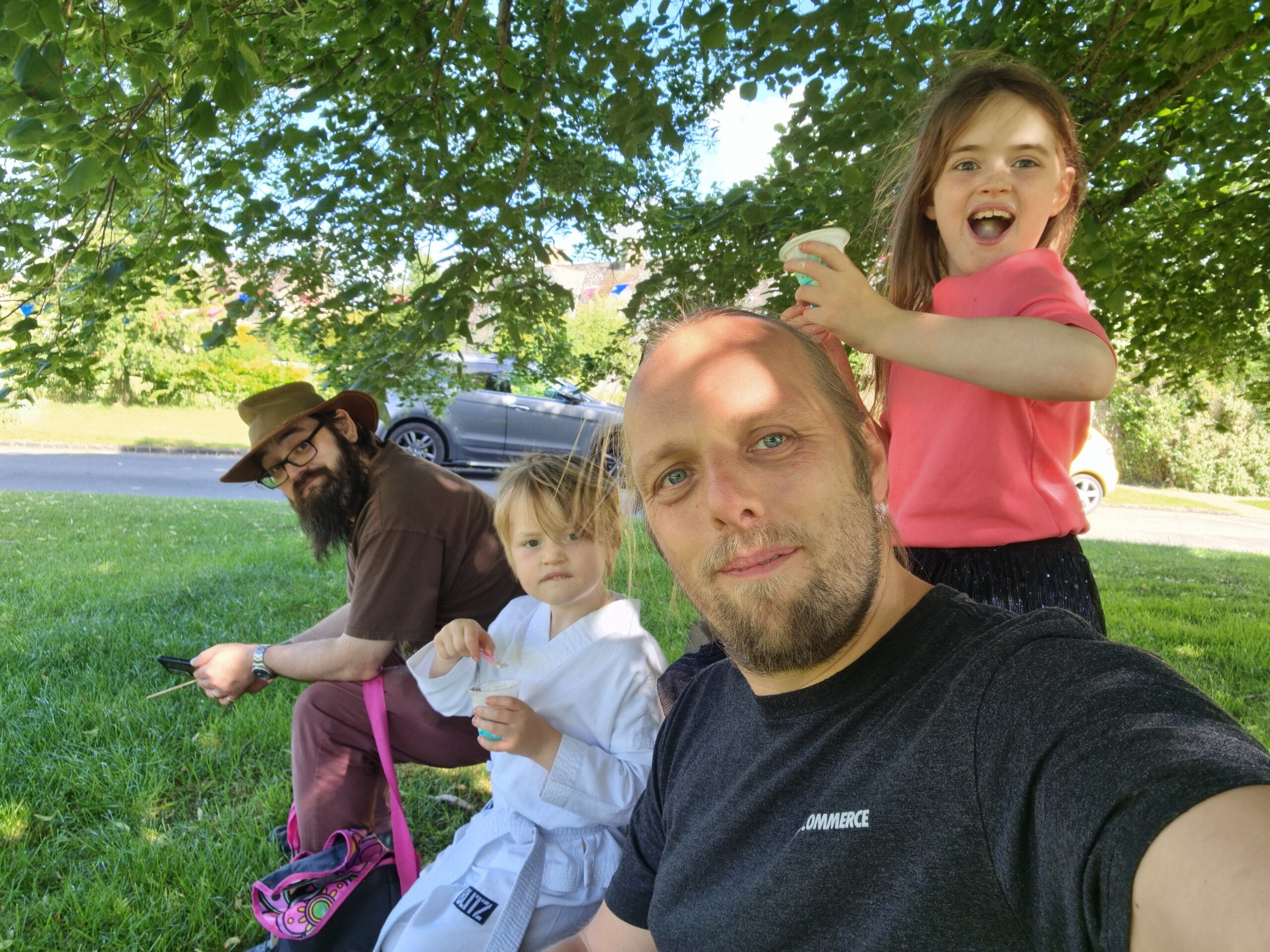 Full image of JTA, John, Annabel and Dan eat ice creams.