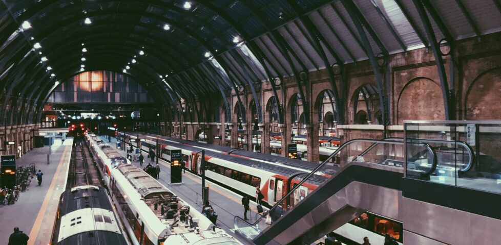 Escalators down onto railway station platforms.