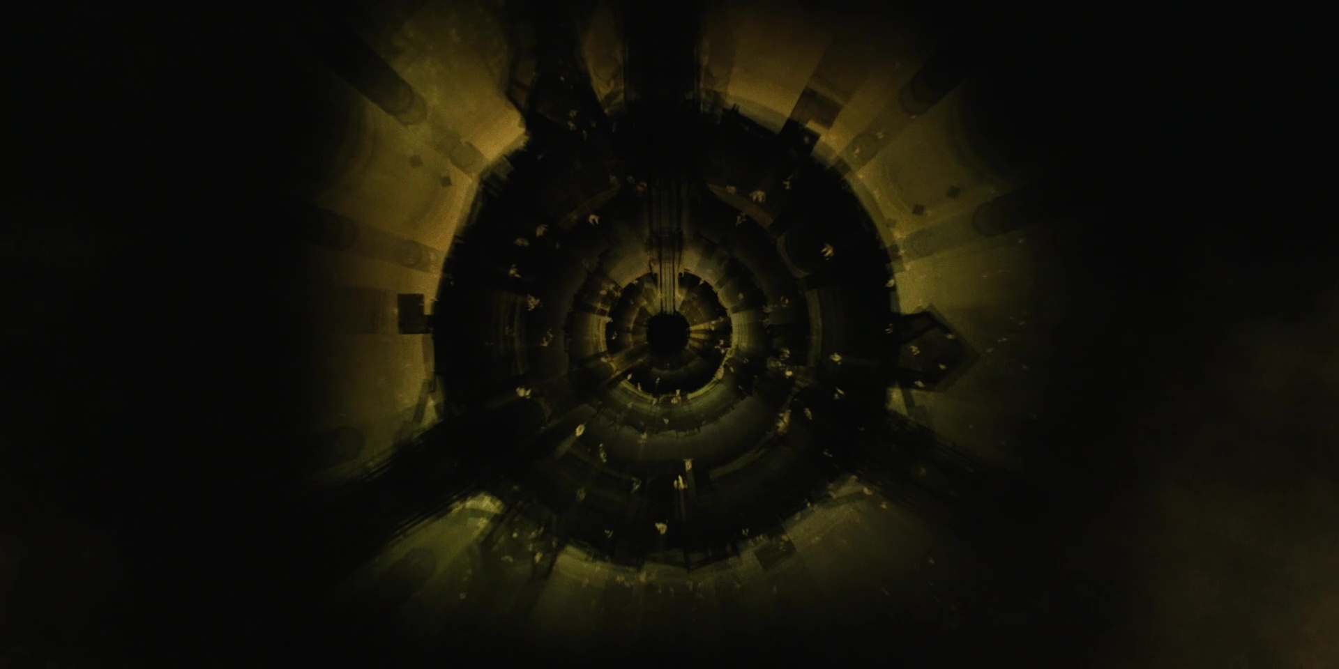 Full image of Dark circle on a yellow background with random radial spokes.
