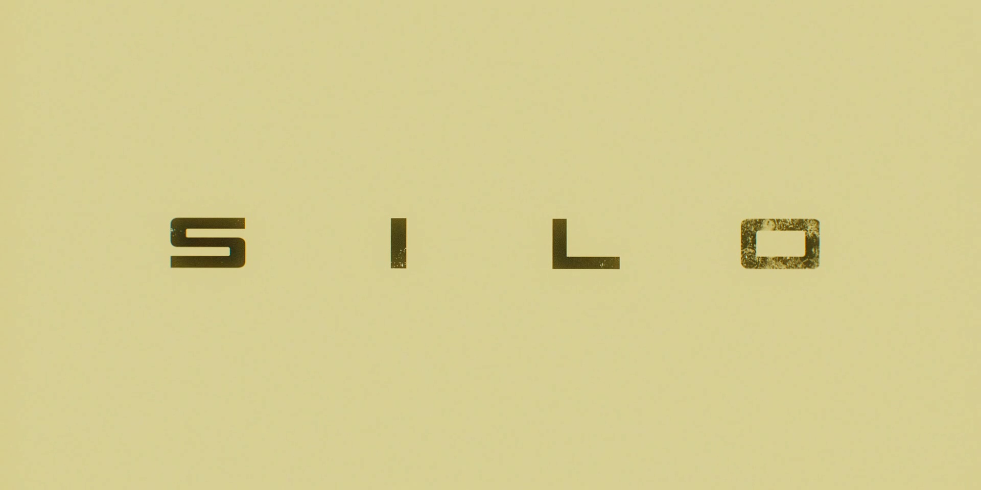Full image of The word "SILO" in a stab-serif font, black on a yellow background.