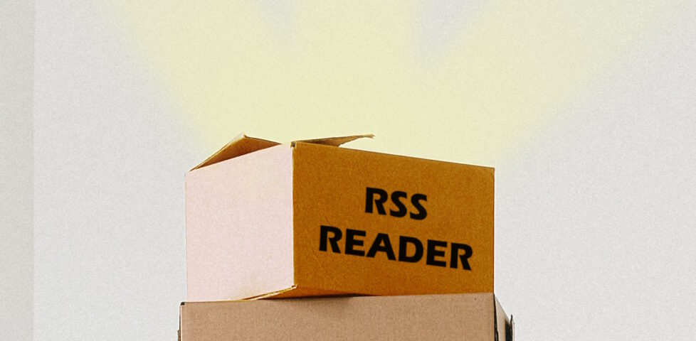 A cardboard box labelled "RSS reader", out of which sunbeams emanate.