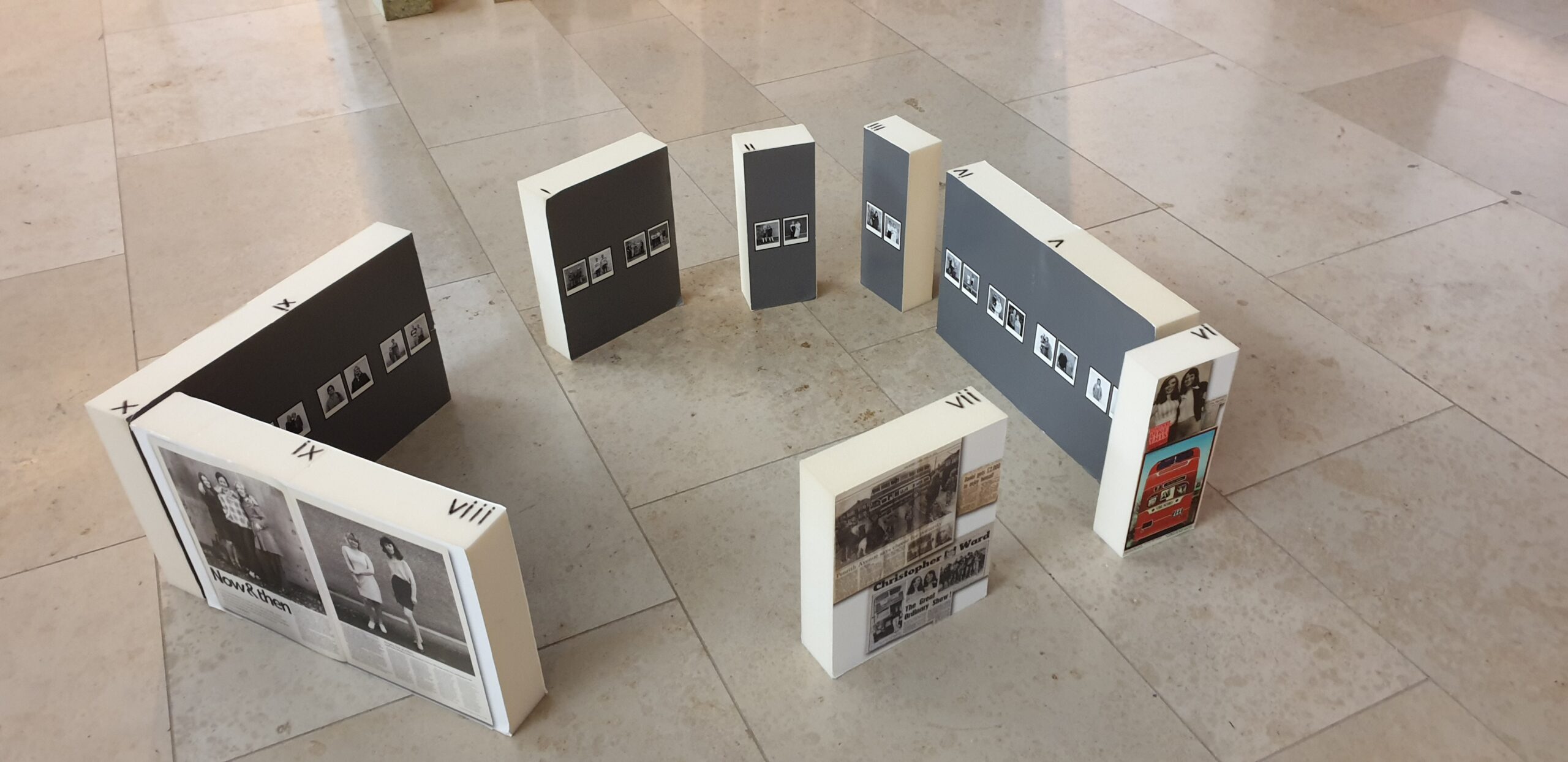 Full image of Miniature model of an exhibition space, constructed using painted blocks and laid-out on the floor of an exhibition space.