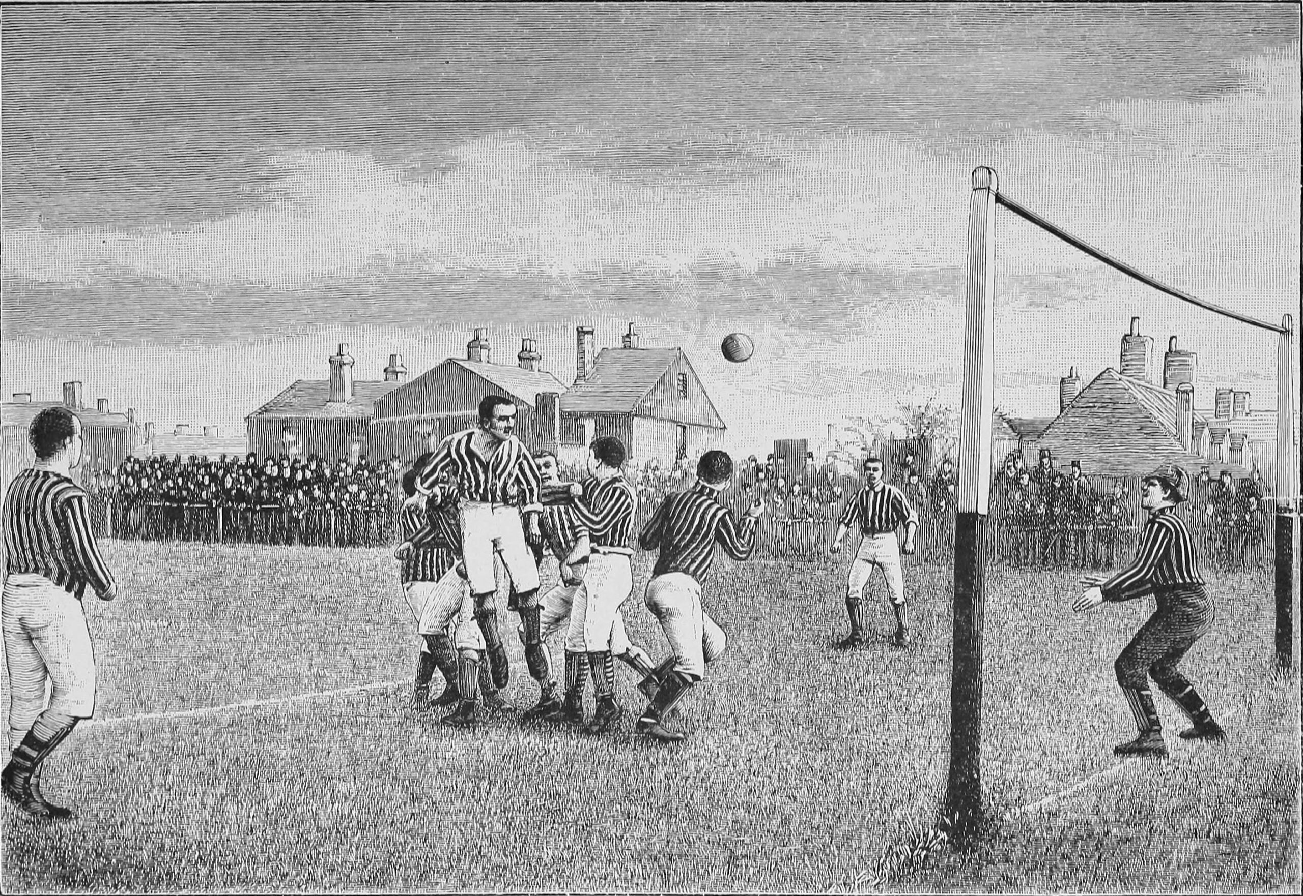Full image of Monochrome line drawing showing a 19th century scene of a football match. The ball appears to have been headed towards the goal by a jumping player; the goalkeeper is poised to dive for it.